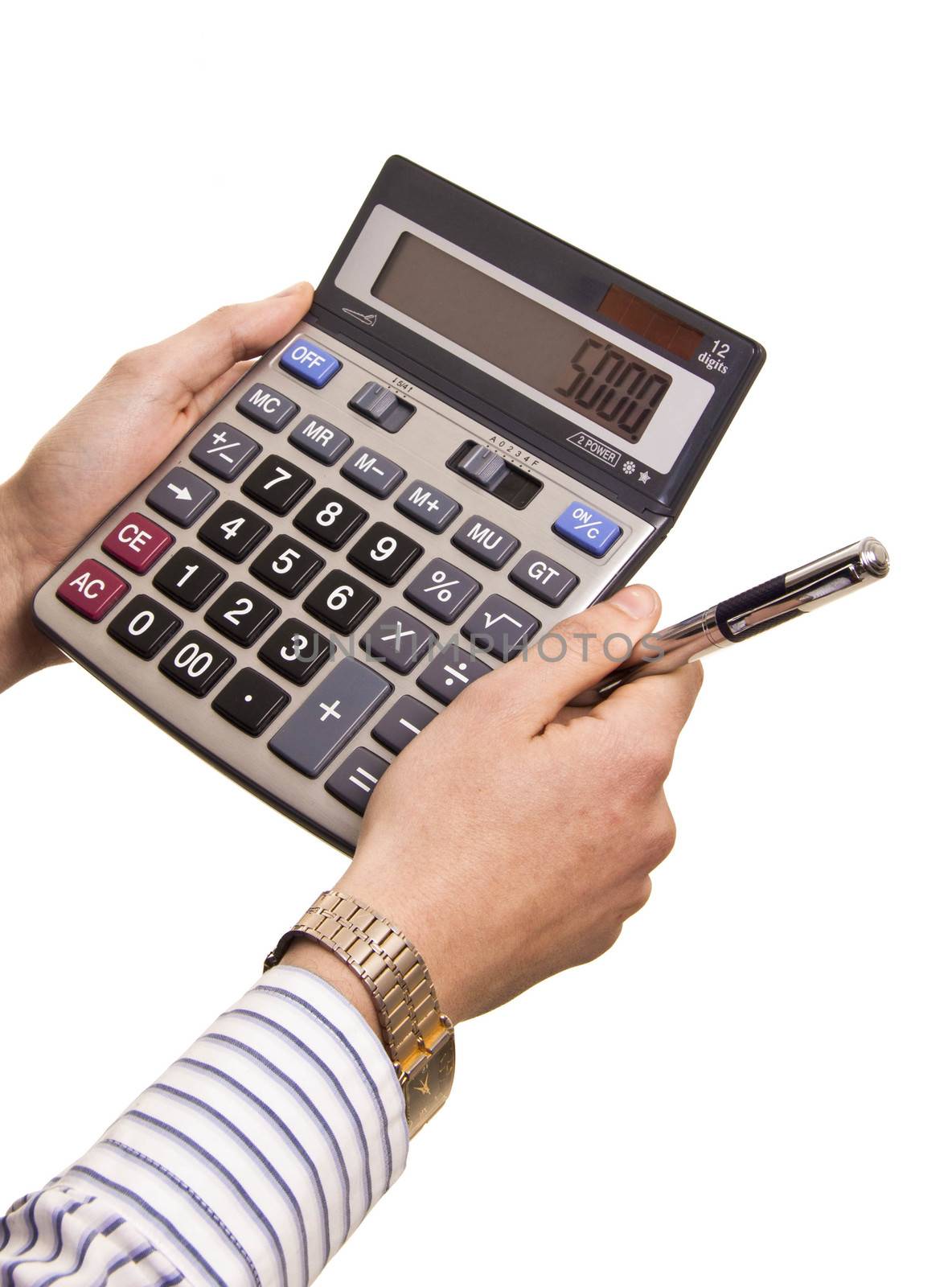 Male businessman using a calculator