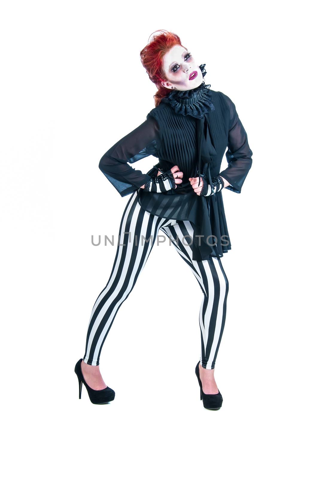 Redhead zombie woman in tight striped pants