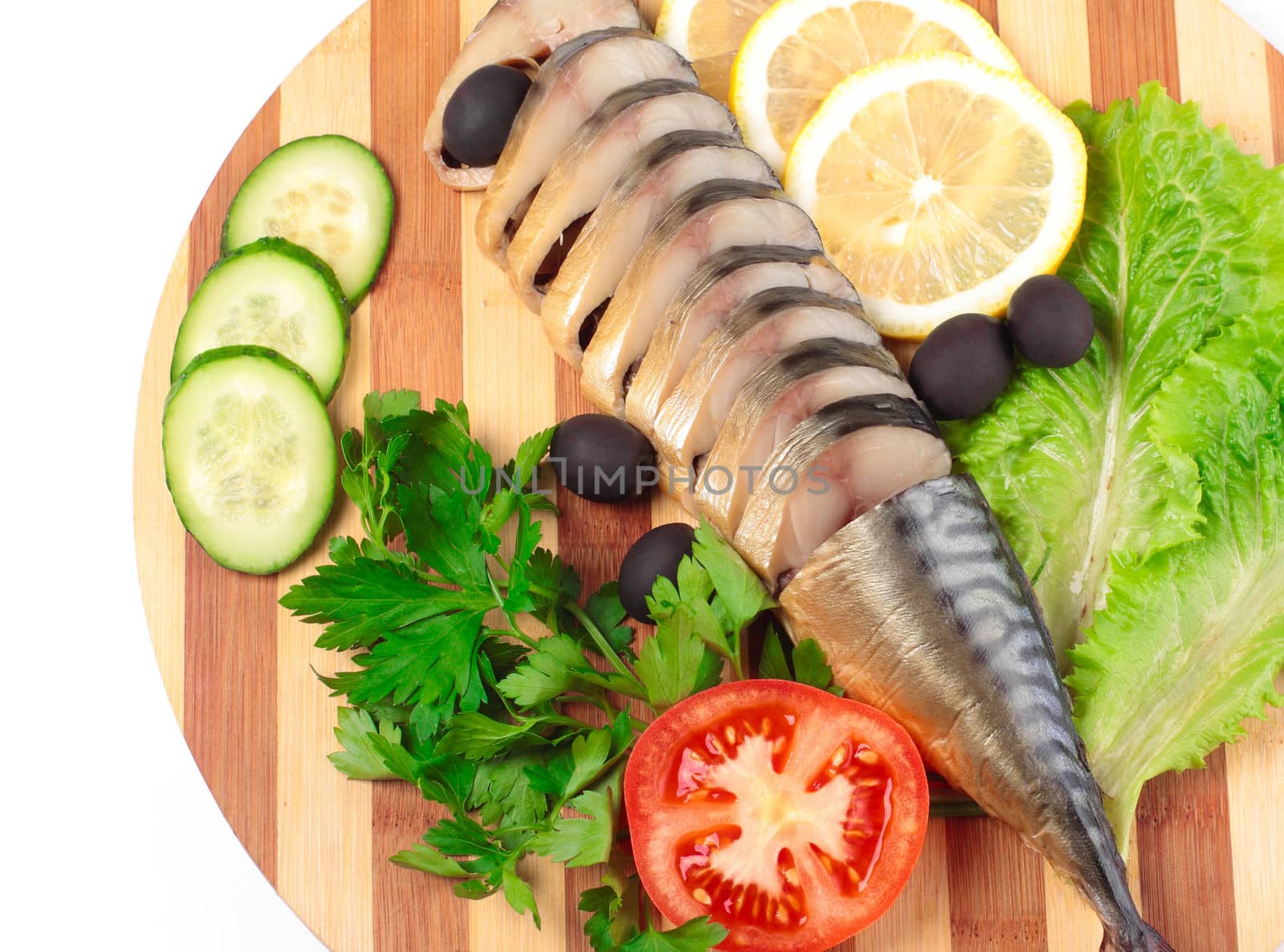 sliced herring on wooden plate