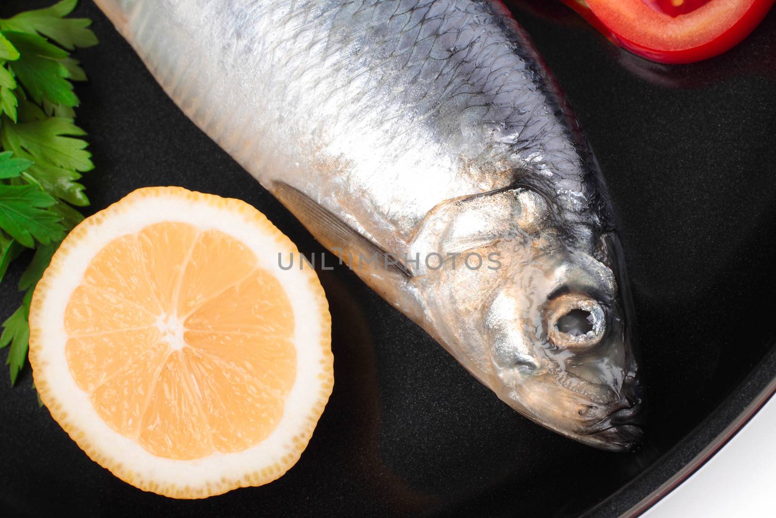 fish on pan with lemon