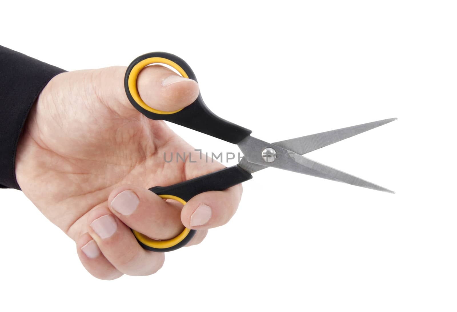 Scissors in hand isolated