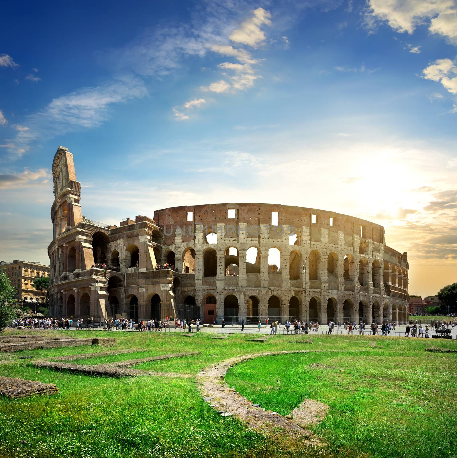 Ruins of great colosseum at the sunset