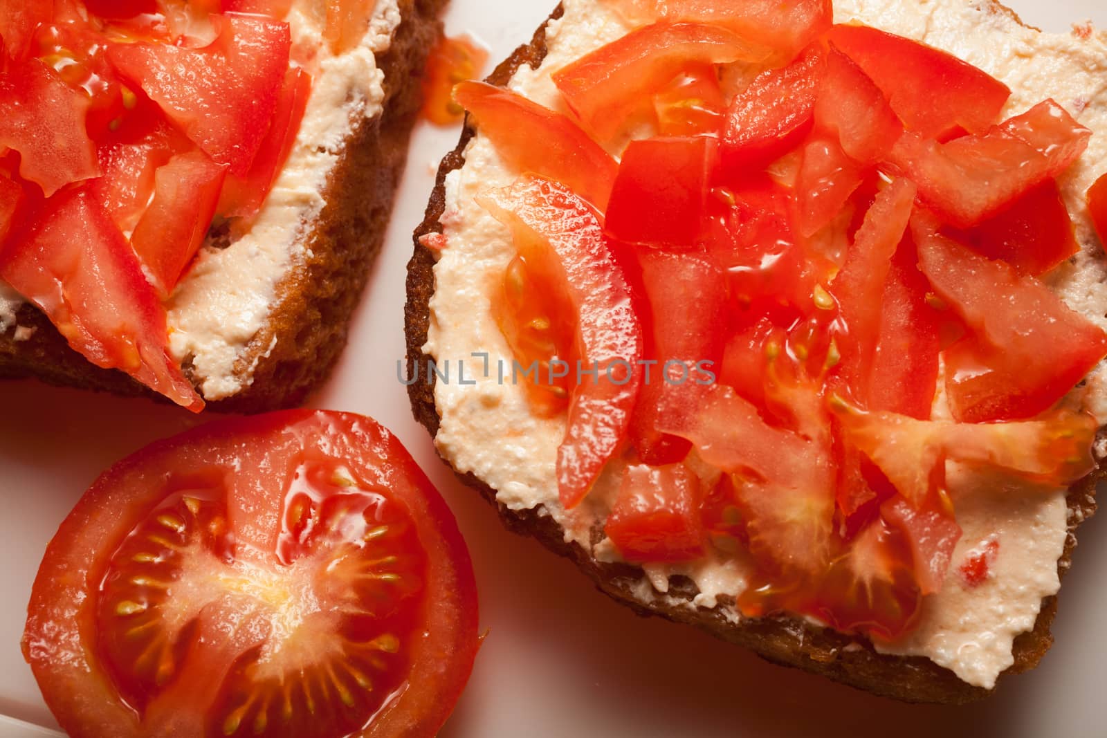 Bread tomatoes and onion top view on food