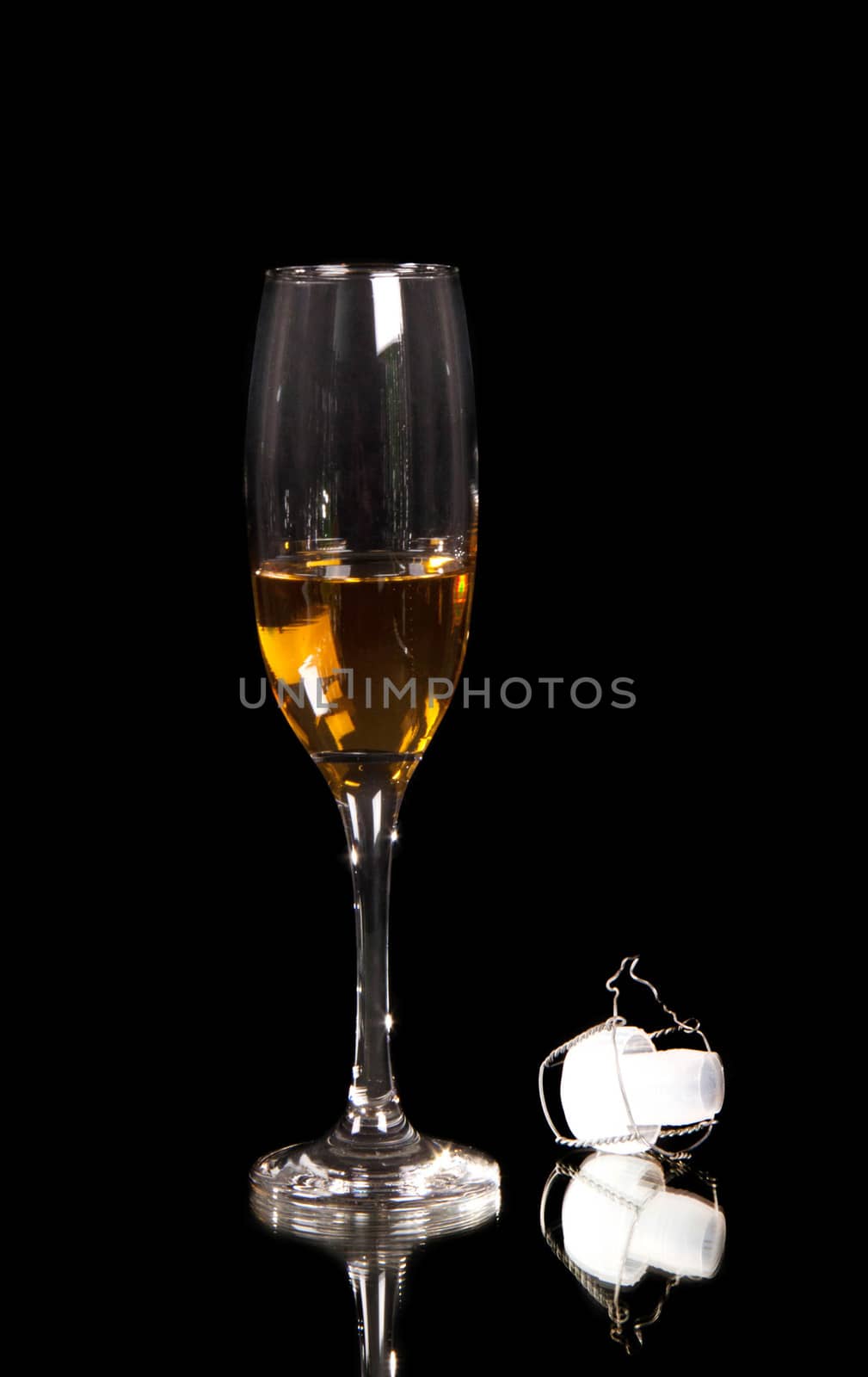 champagne glass with plastic corn