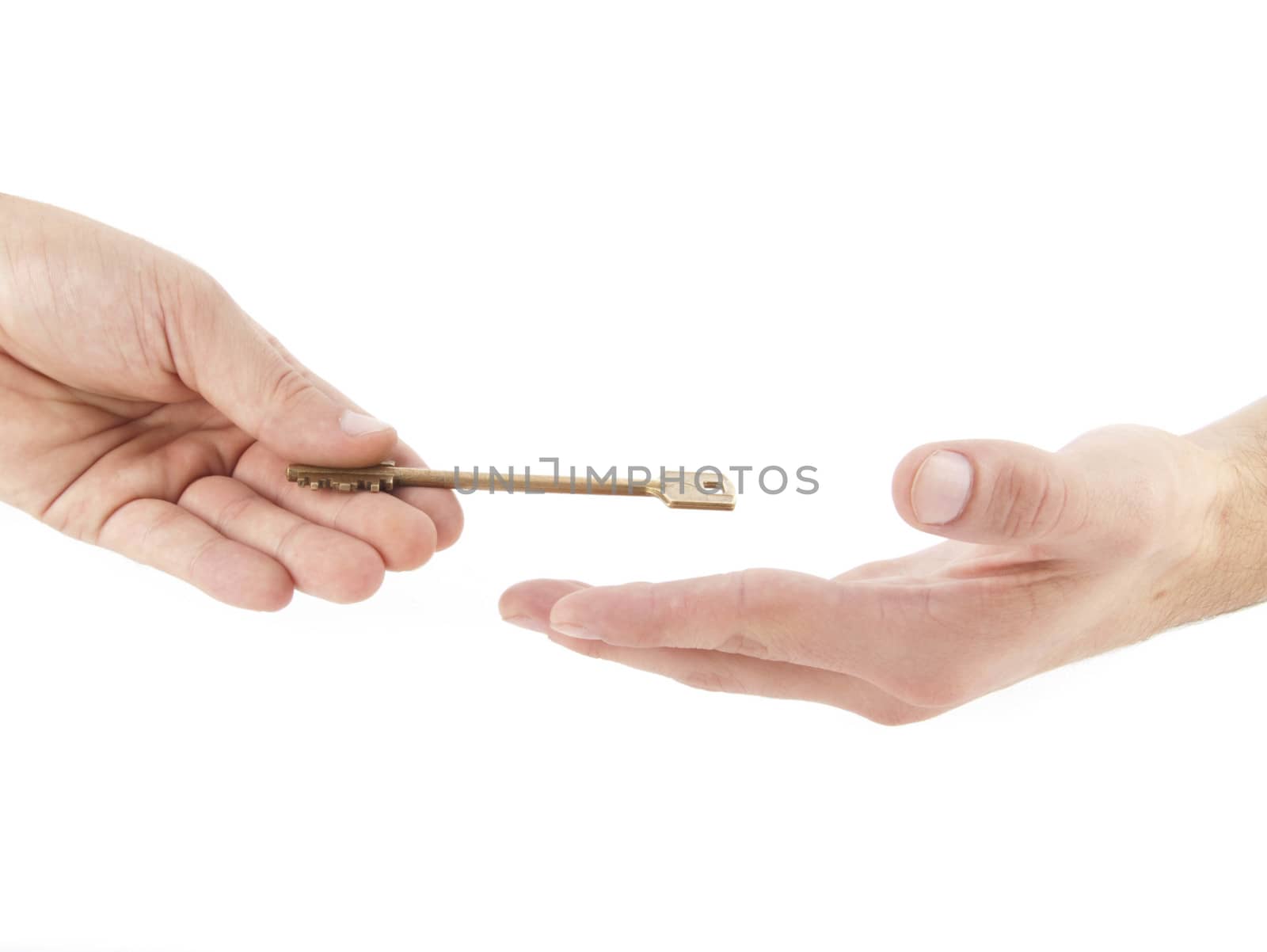 Male hand holding golden key