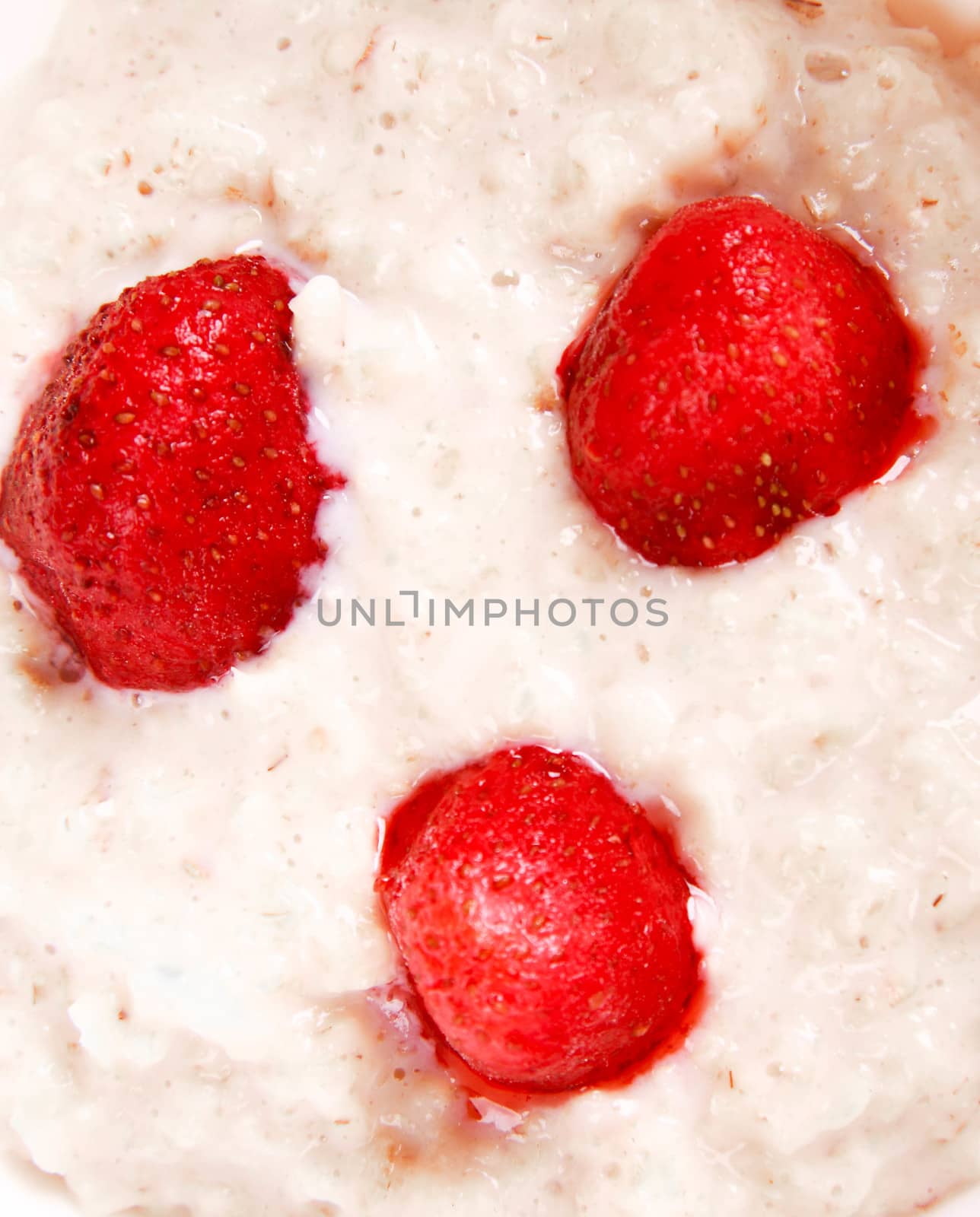 Fresh strawberries in porridge by shutswis