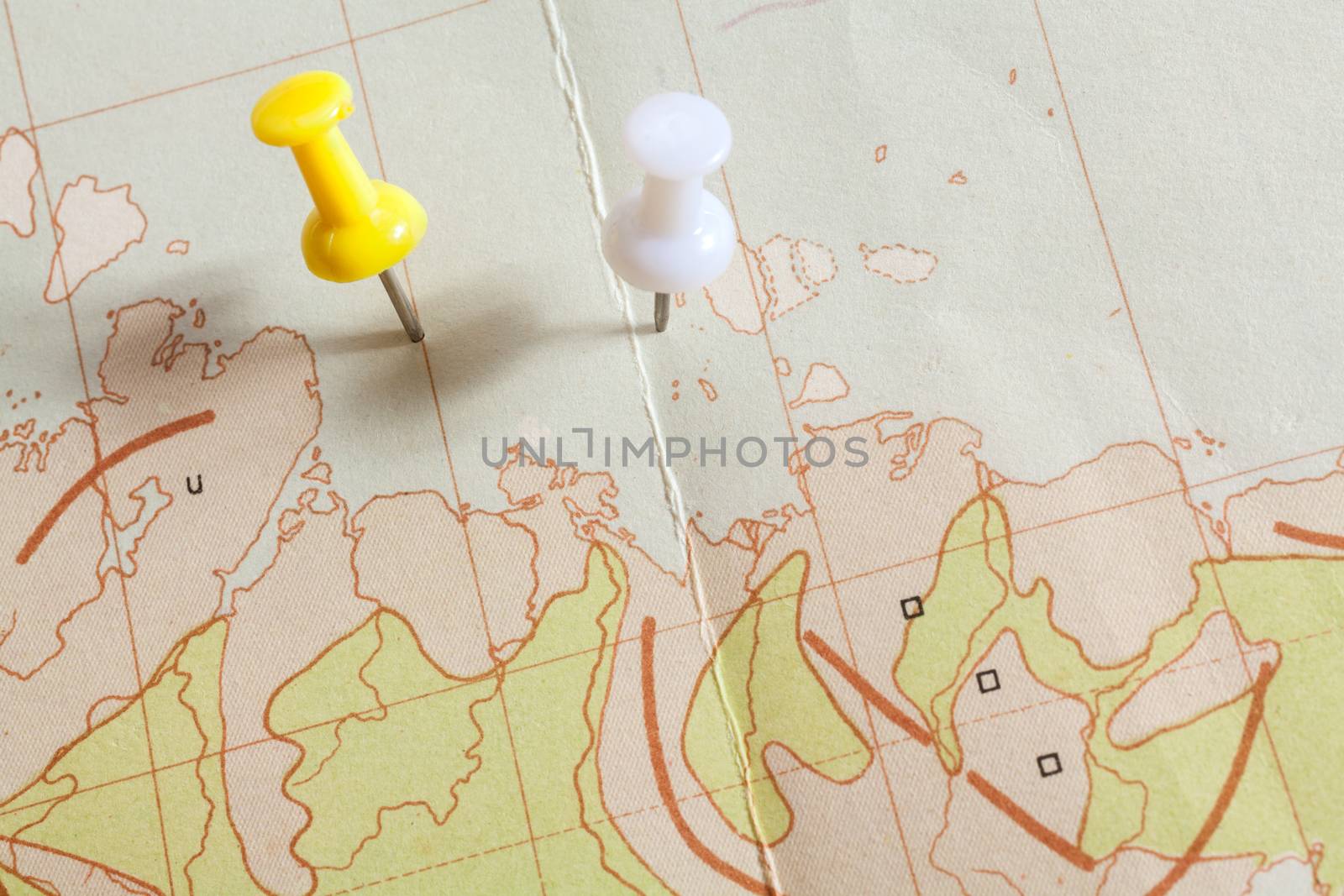 Thumbtack in a Map by Portokalis