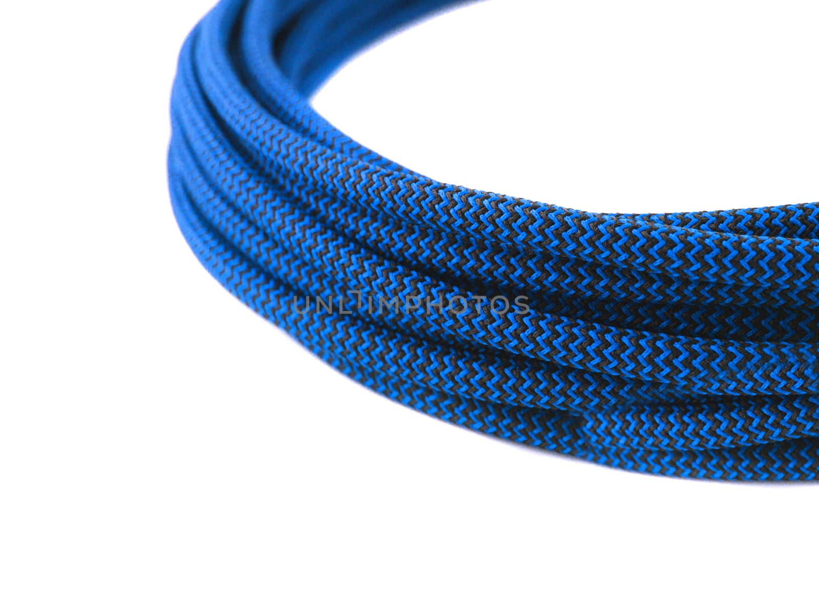 Closeup of blue rope on white background