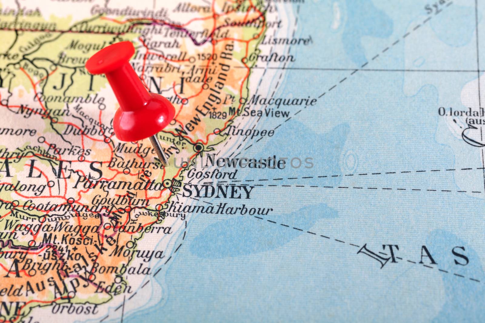 Red push pin showing the location of a destination point on a map. Australia - Sydney