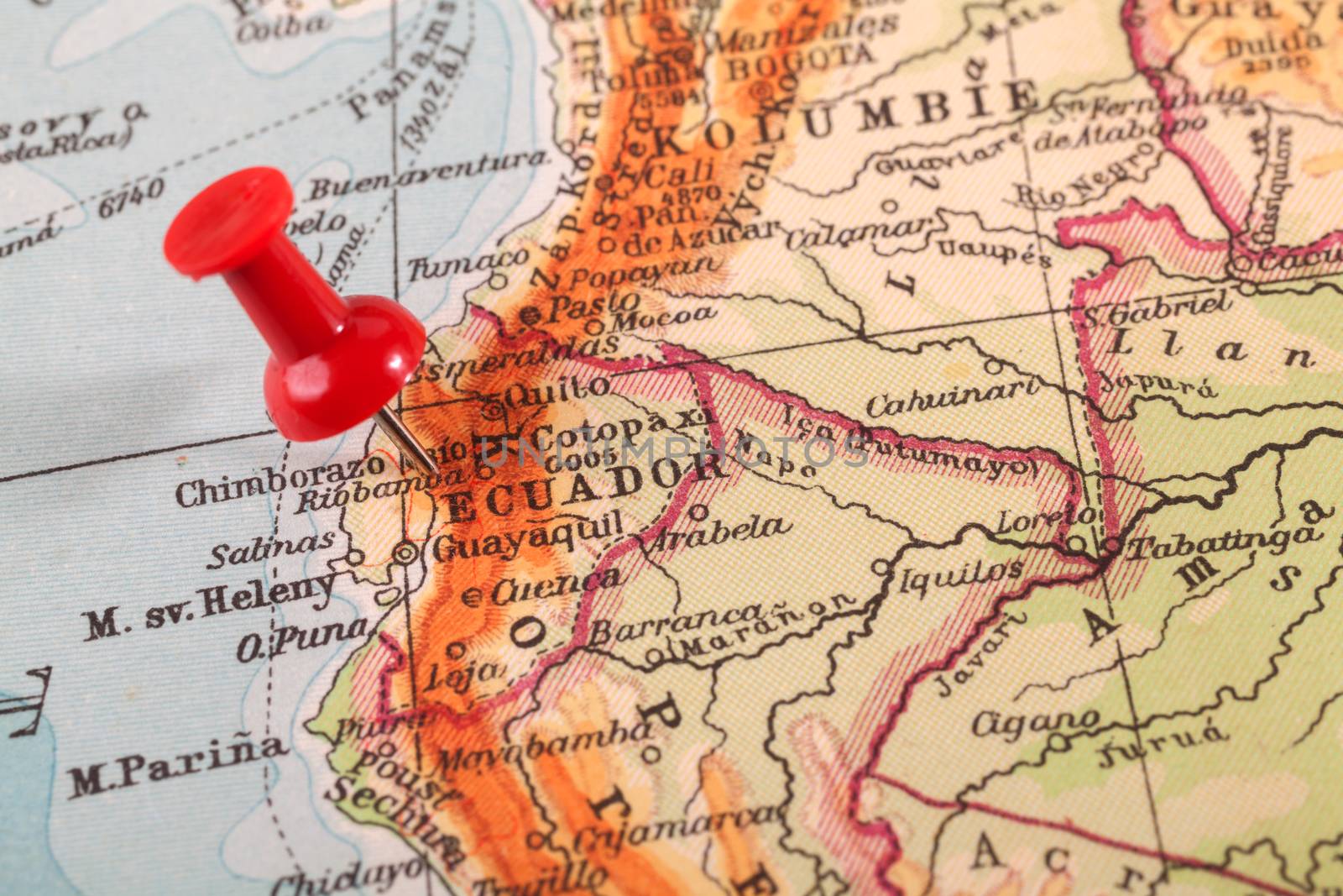 Red push pin showing the location of a destination point on a map. Ecuador