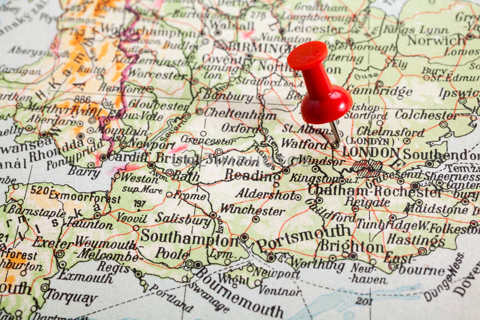 Red push pin showing the location of a destination point on a map. London
