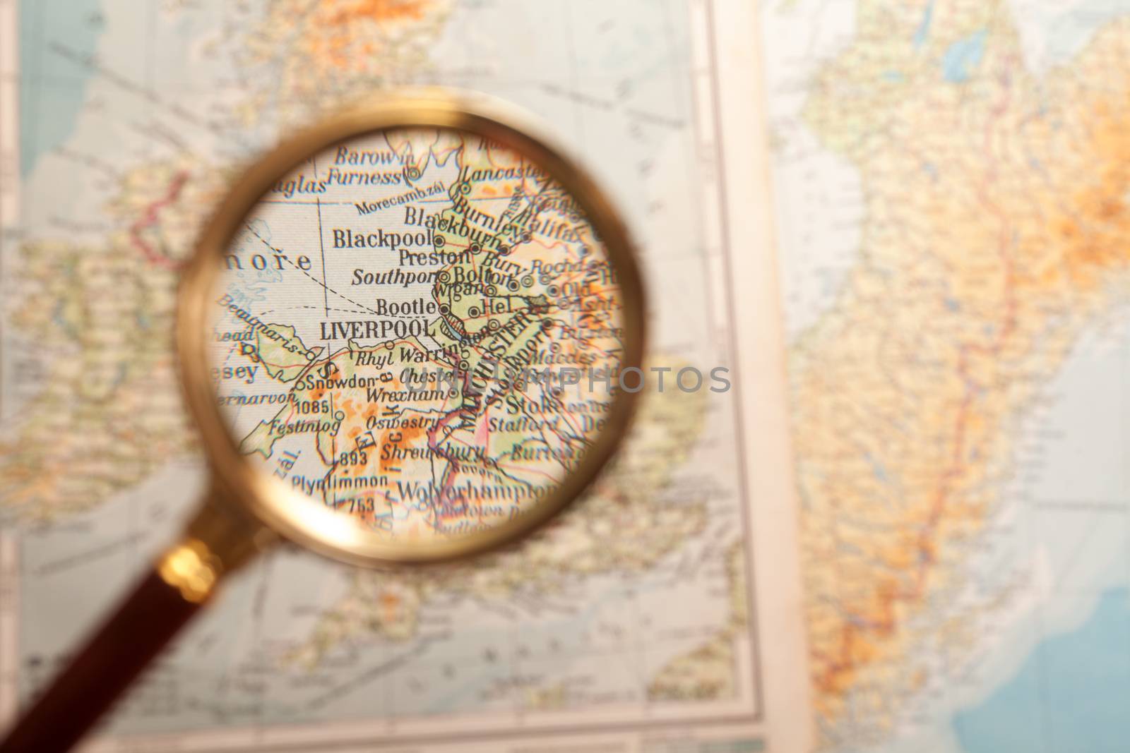 Magnifying glass in front of a Liverpool map