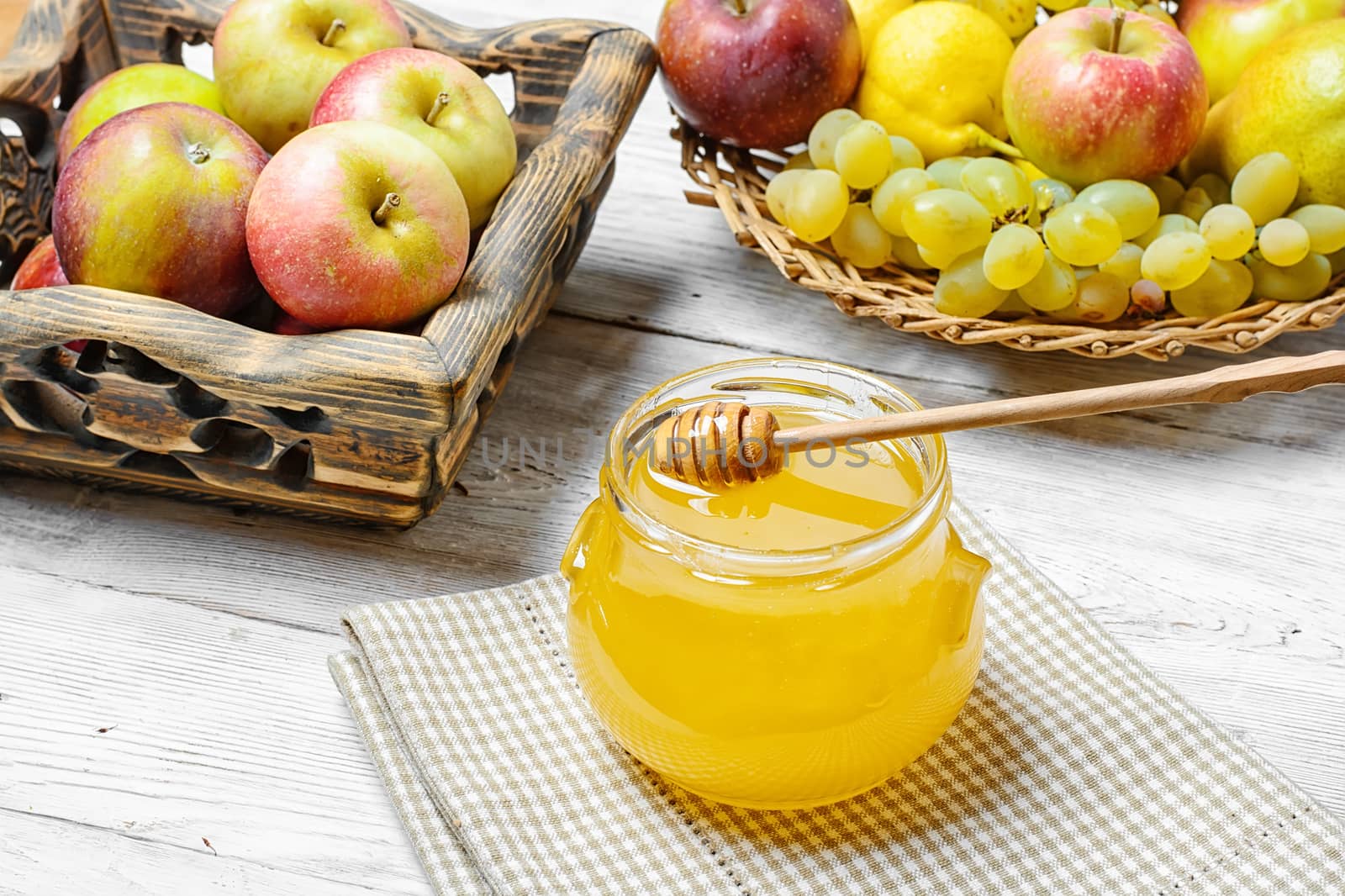 Still life with apples and honey to the August holiday