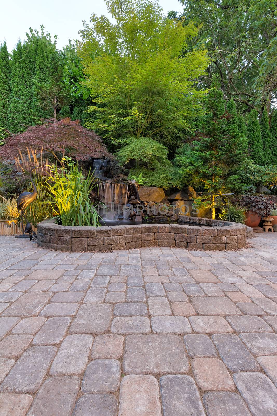 Backyard Garden Paver Brick Patio with Waterfall Pond and Landscaping