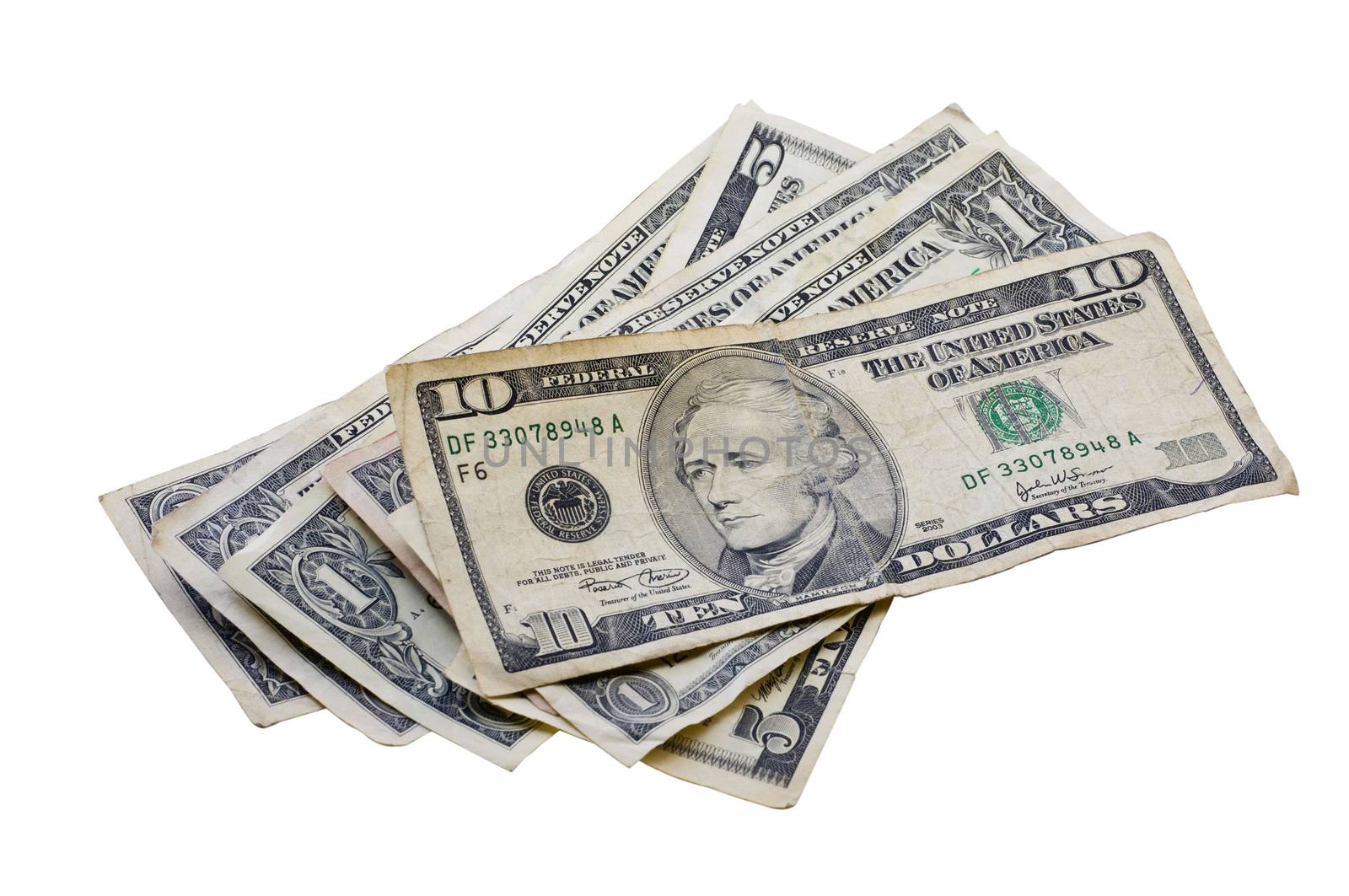 Small pile of various American money isolated on white with a clipping path