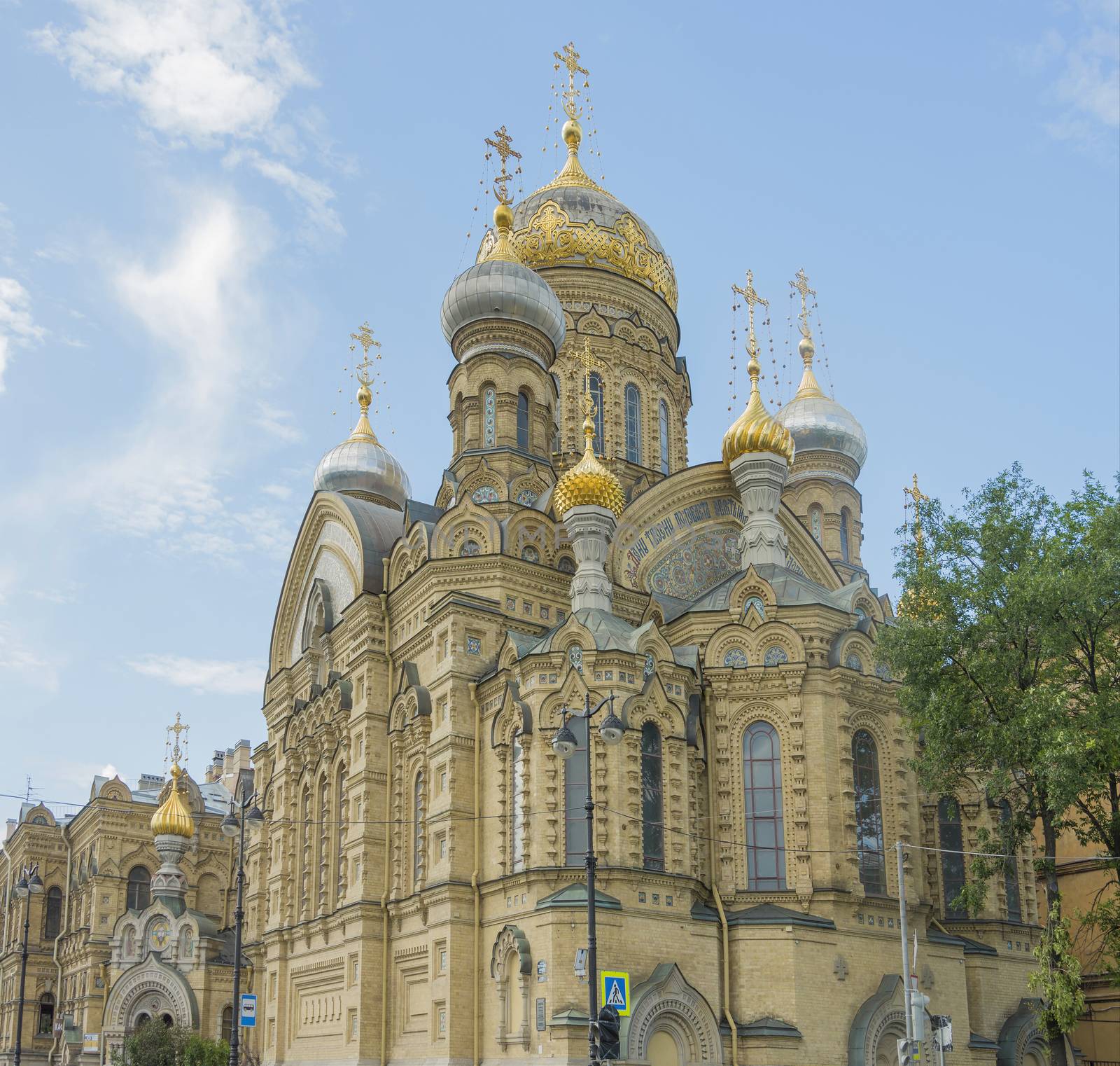 beautiful Christian church in St. Petersburg with golden domes and crosses