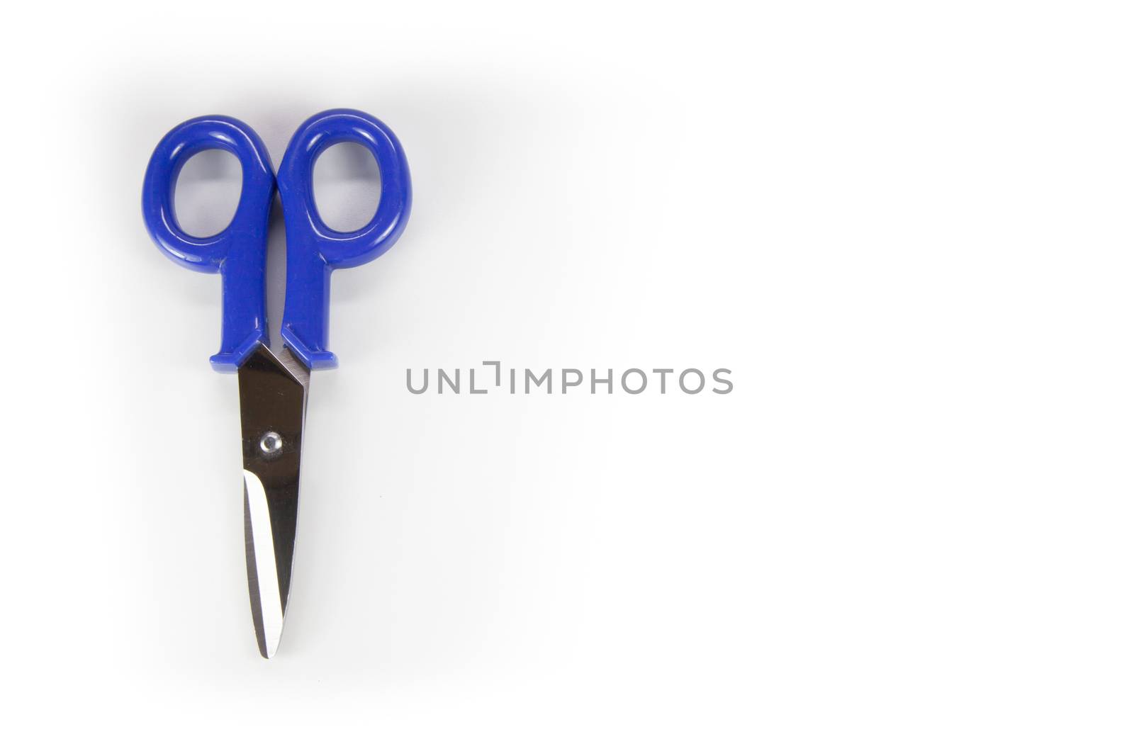 Typical electrical used scissors with blue arms