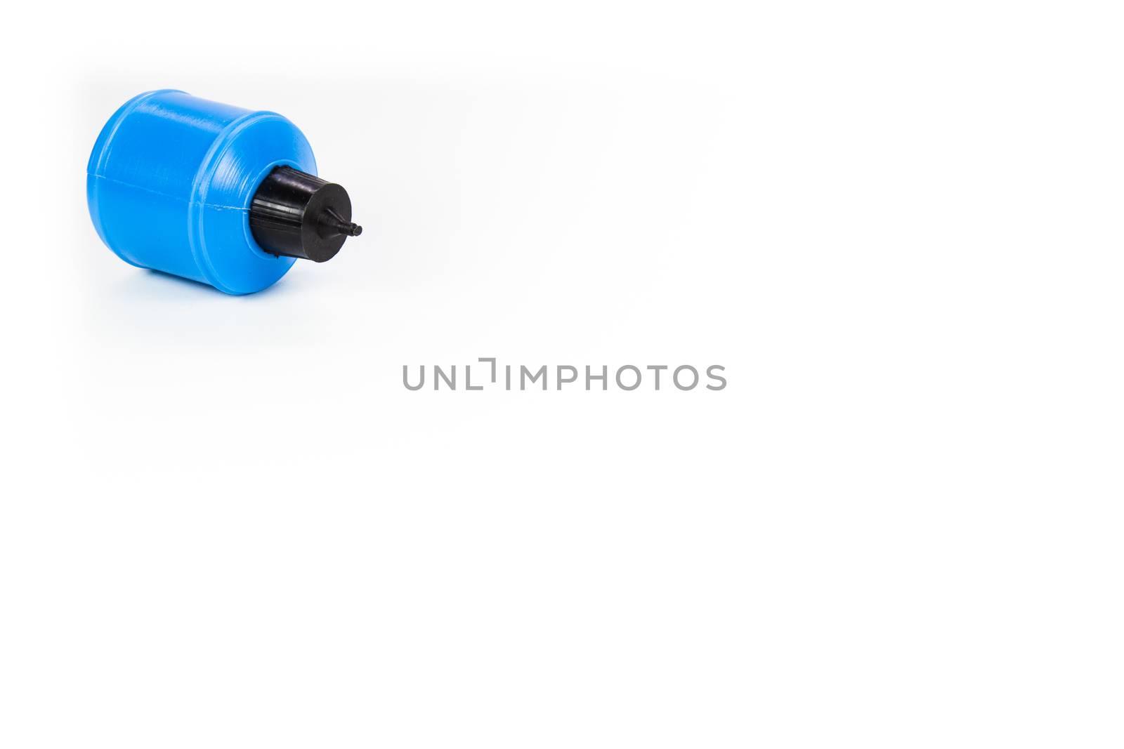 plastic blue  glue container fallen isolated on white