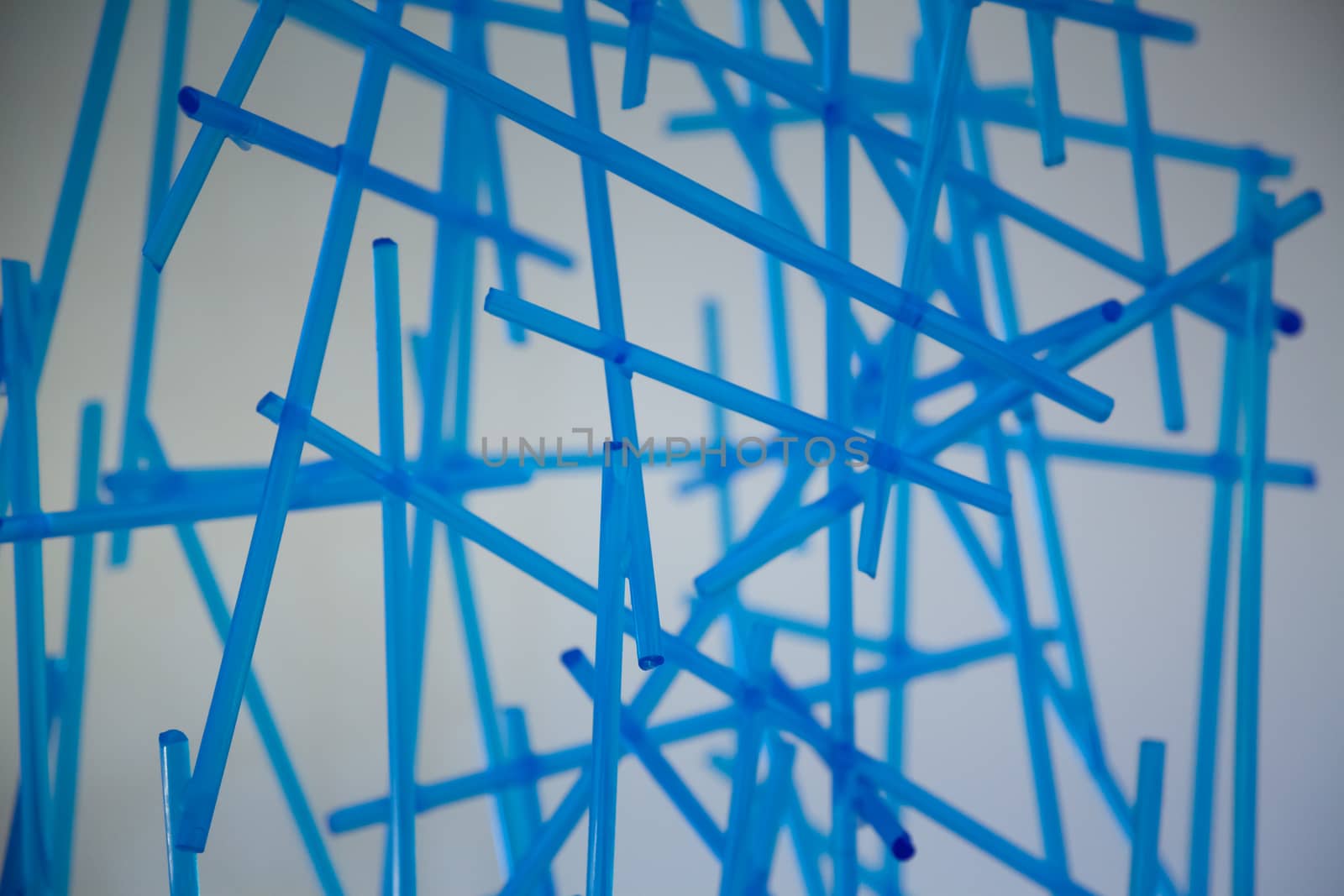 Macro vision on small glass blue pipes