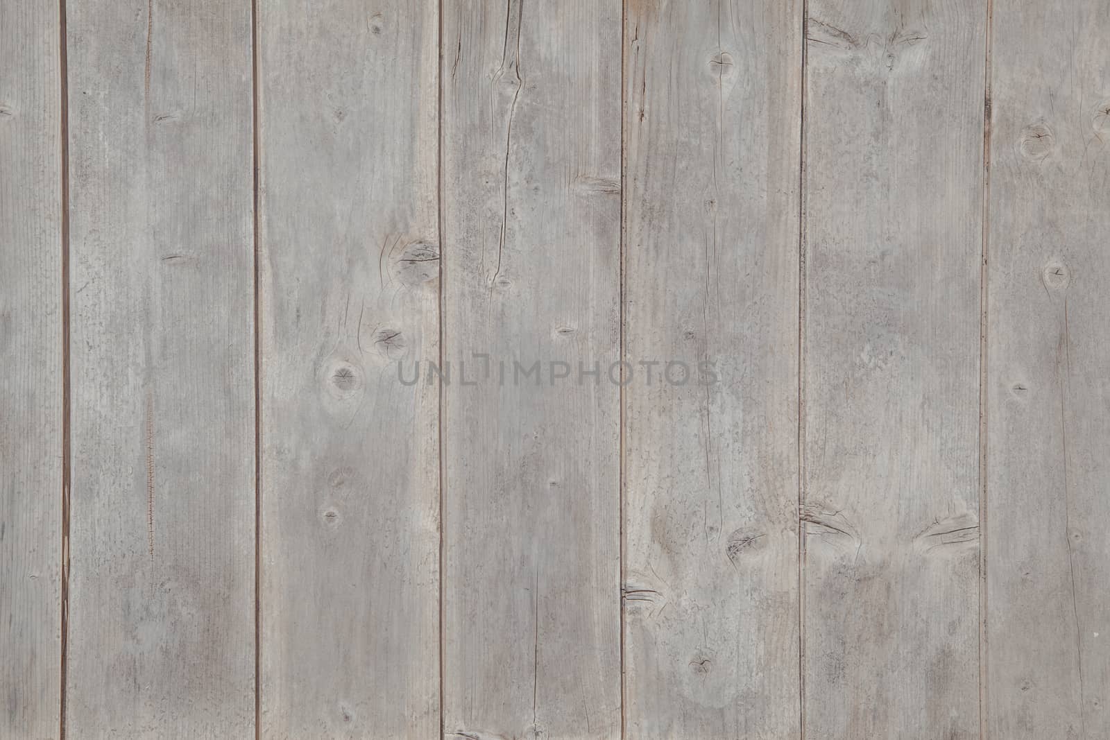 Weathered wood panels on an ancient floor