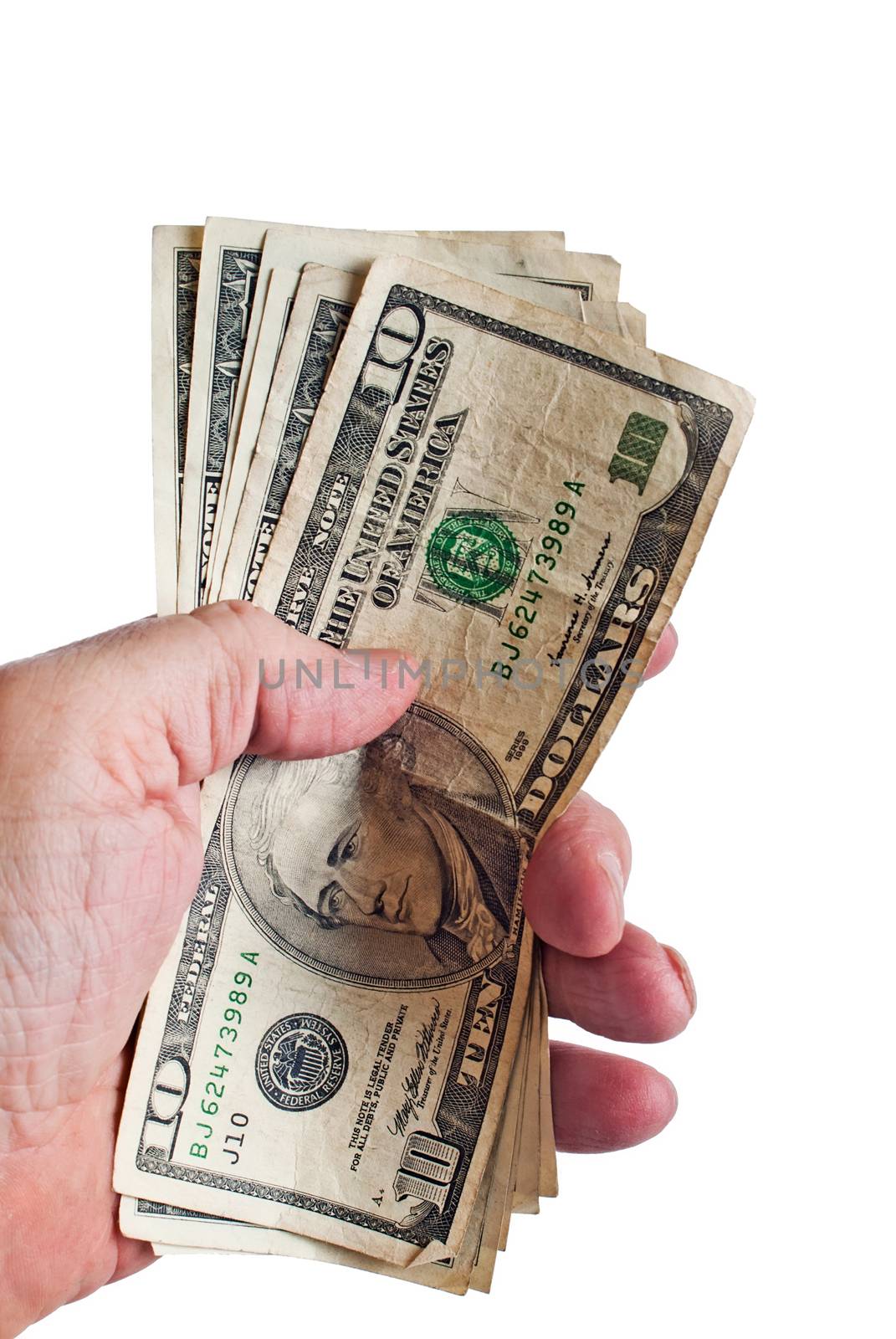 Male hand holding a small amount of USA paper currency. Isolated against a white background.