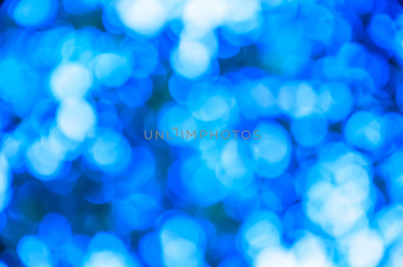 Light blur and bokeh blue color background by worrayuth