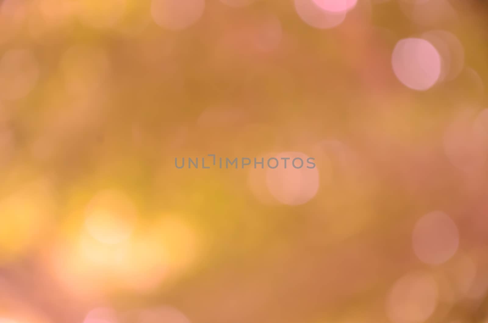 Light blur orange color background by worrayuth