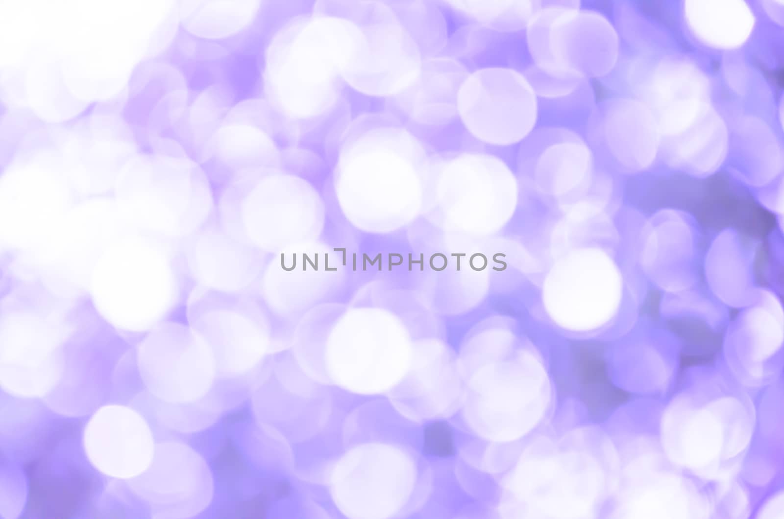 Purple light bokeh background by worrayuth