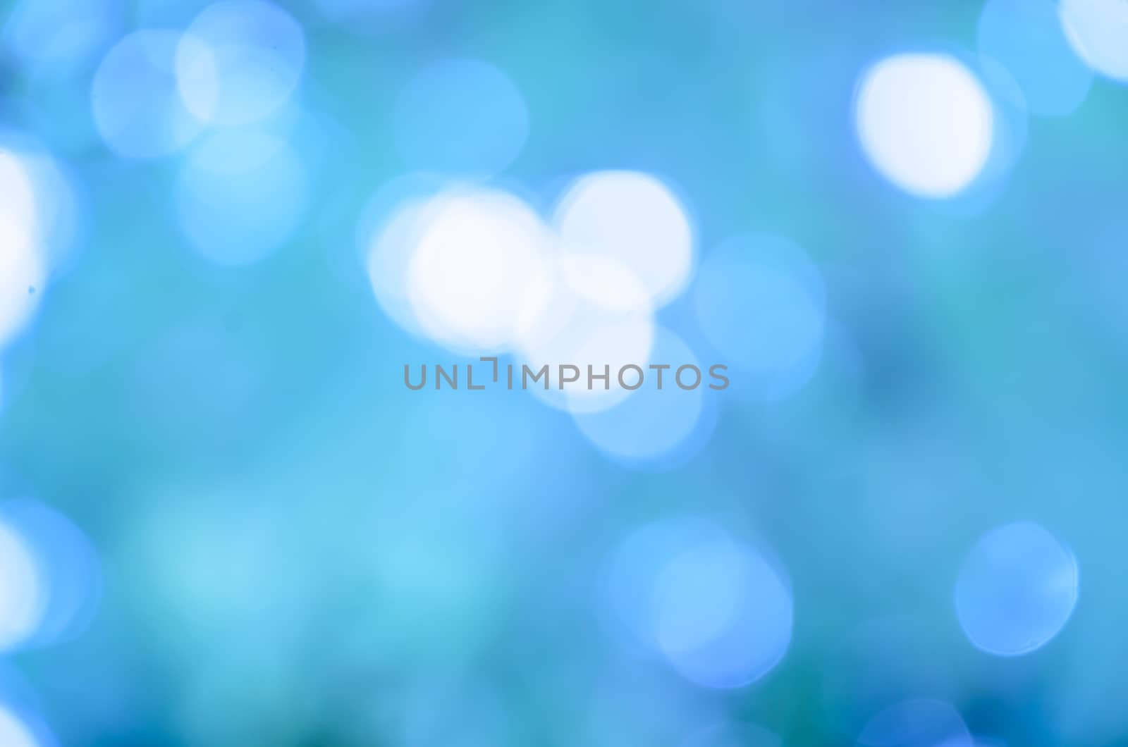 Bokeh and light blue color background by worrayuth