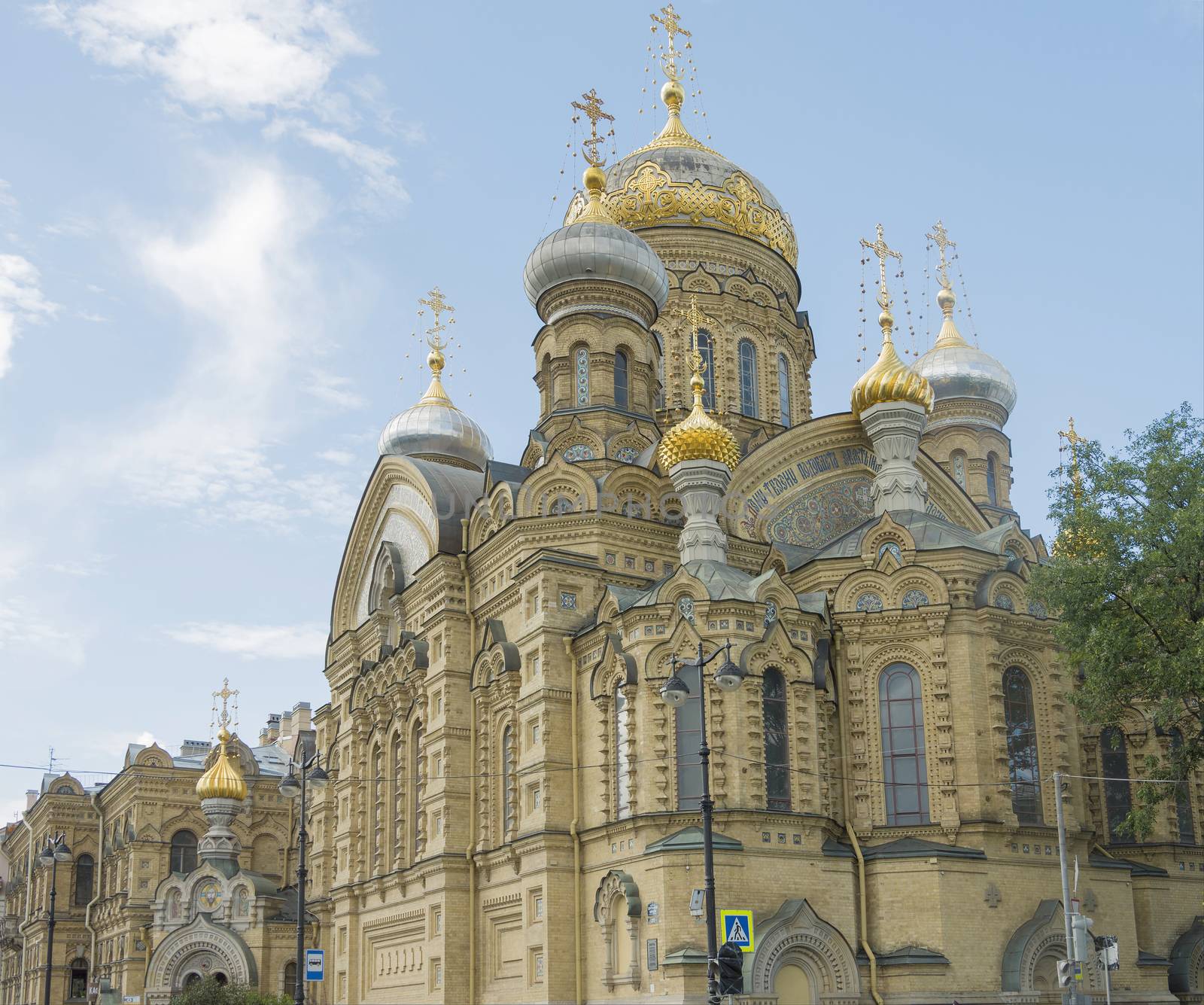 beautiful Christian church in St. Petersburg with golden domes and crosses