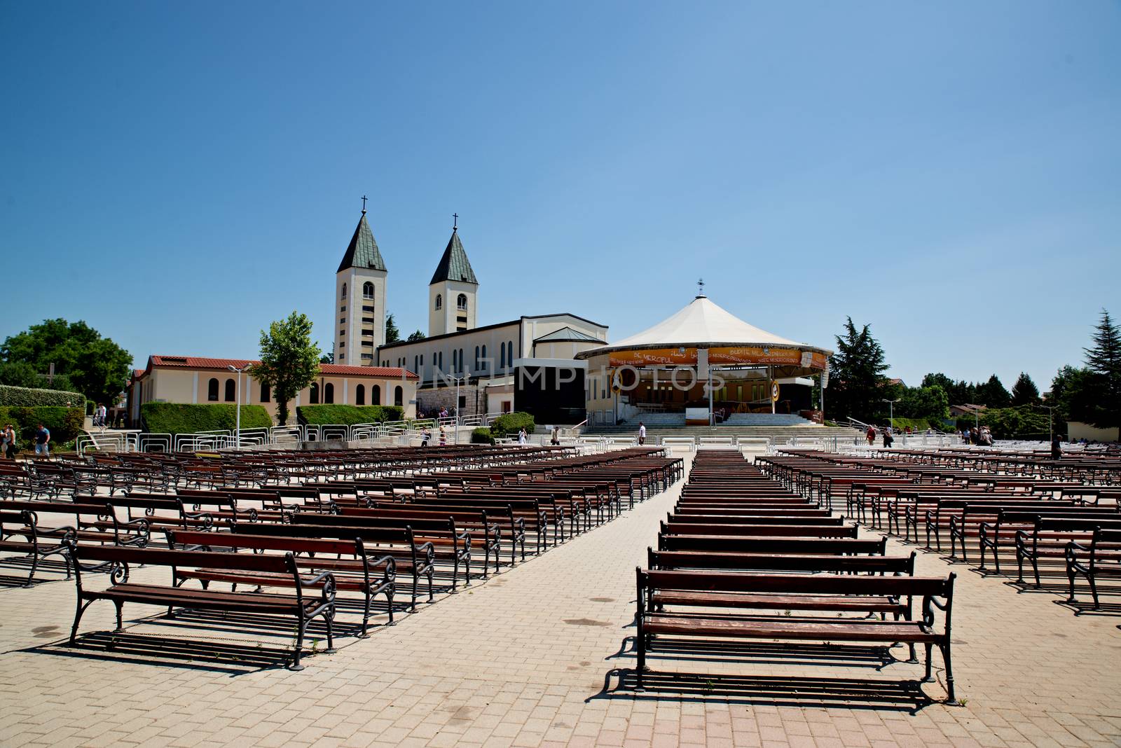 MEDUGORJE, BOSNIA AND HERZEGOVINA - JULY 4, 2016: Benches and altar behind the parish church of St. James, the shrine of Our Lady of Medugorje