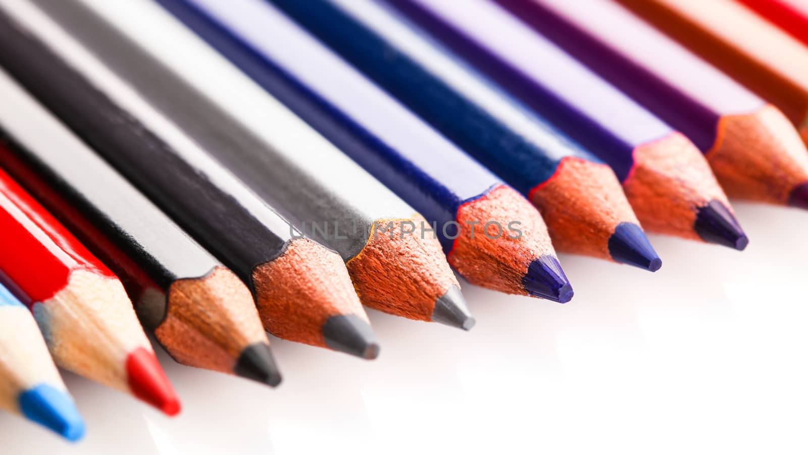 colored pencils close-up while lying in a row