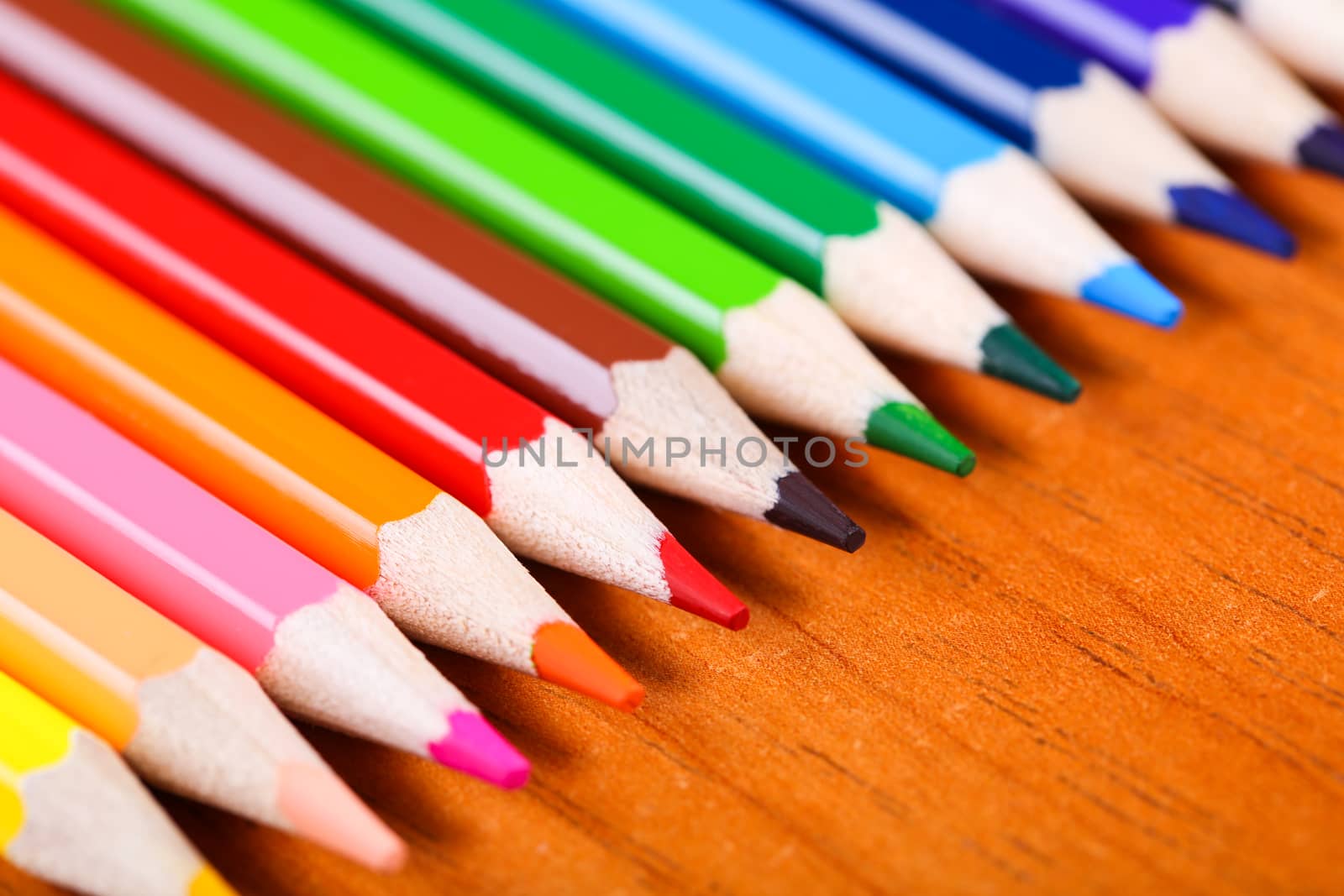 colored pencils close-up while lying in a row