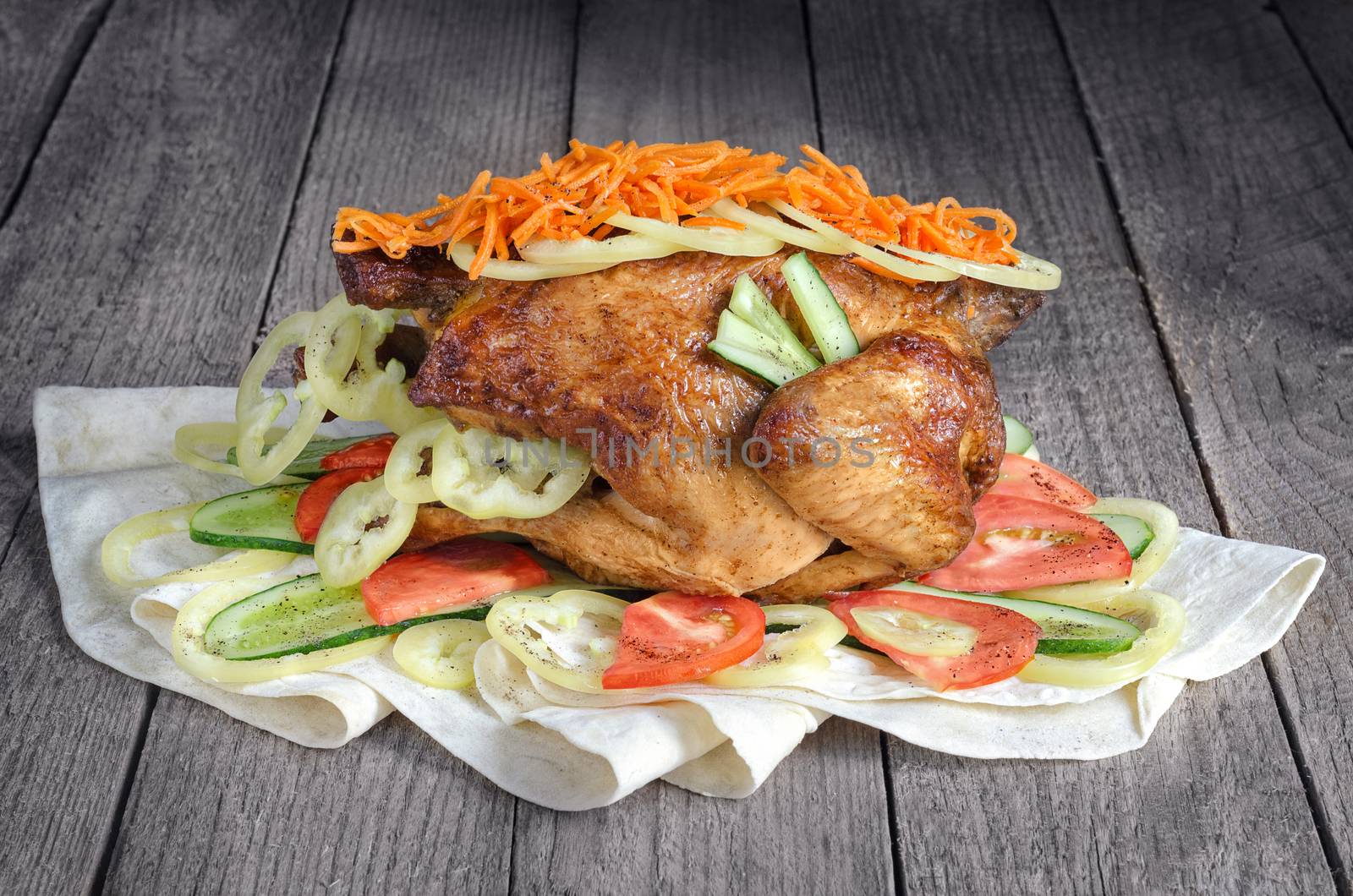 Roast chicken with vegetables lying on a PITA by Gaina