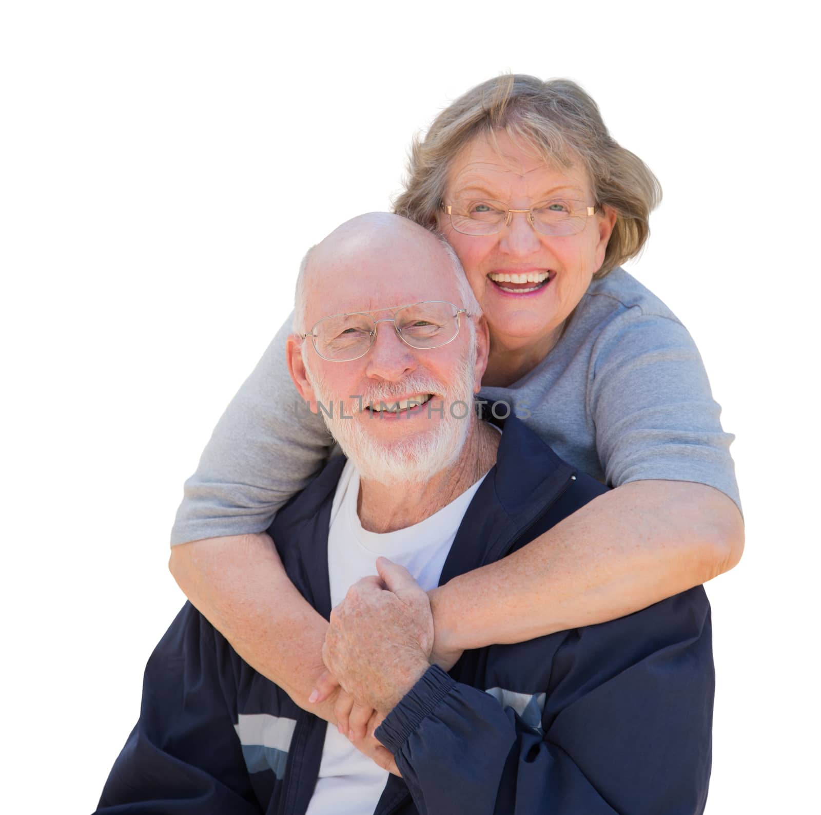 Happy Loving Senior Couple Hugging and Laughing Isolated on a White Background.