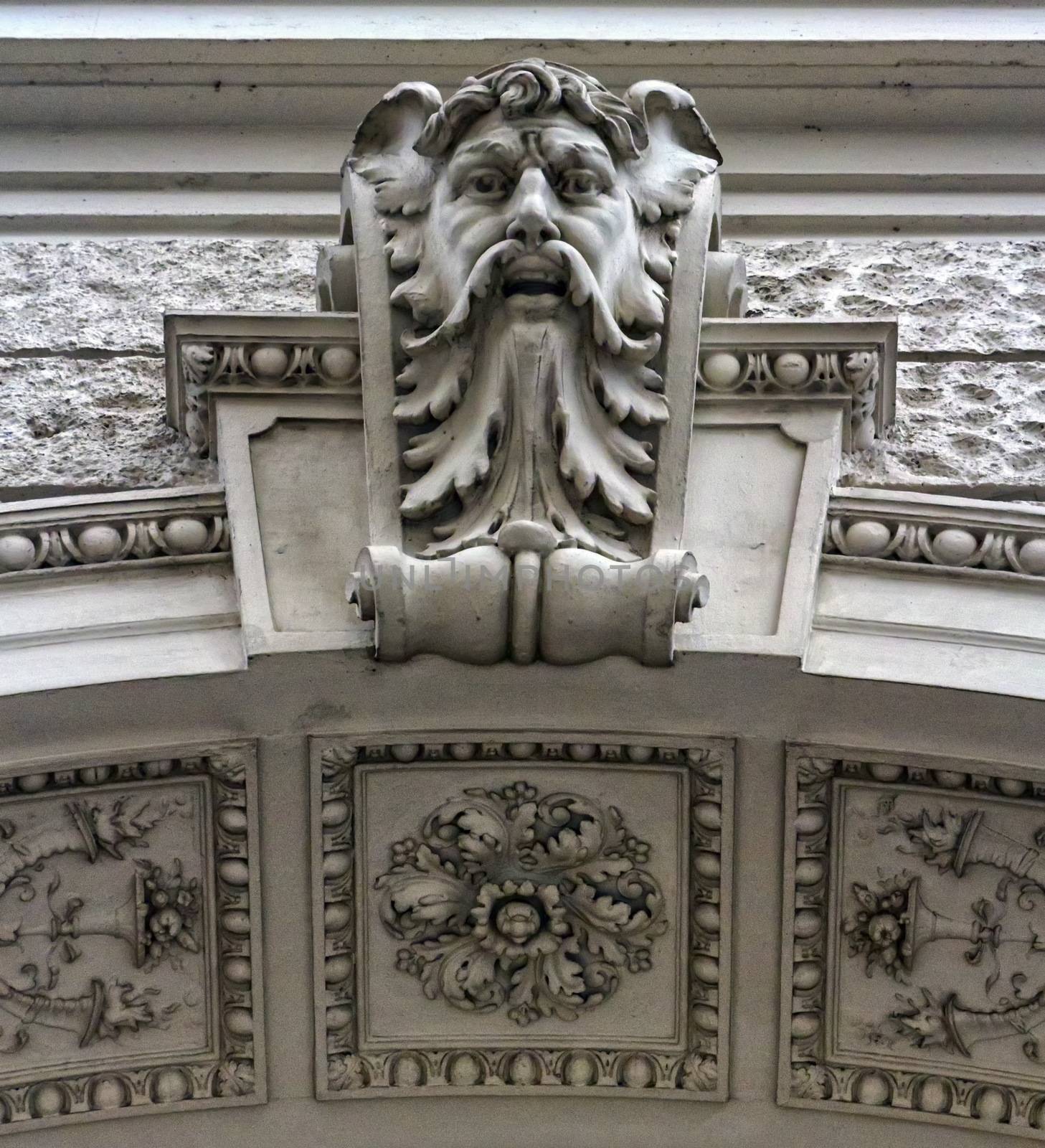 Head sculpture on a building, Vienna, Austria by Elenaphotos21