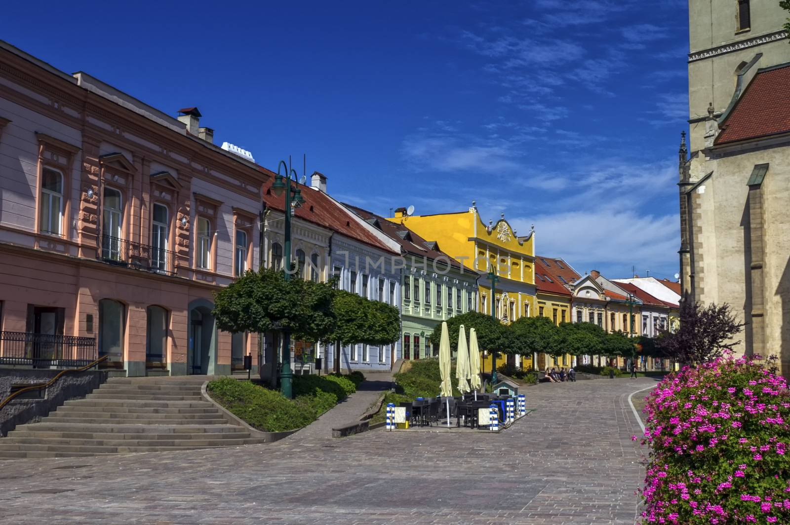 Historic houses and St. Nicolaus Church, Presov, Slovakia by Elenaphotos21