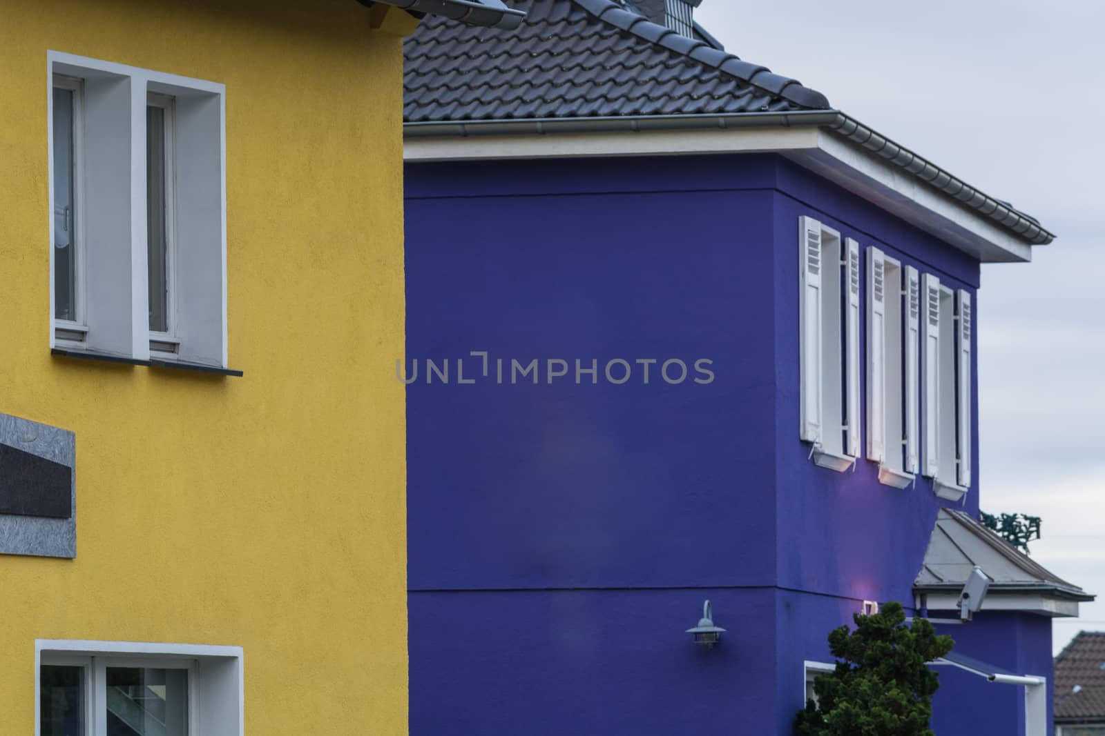 Front view of two house fronts with fresh paint.