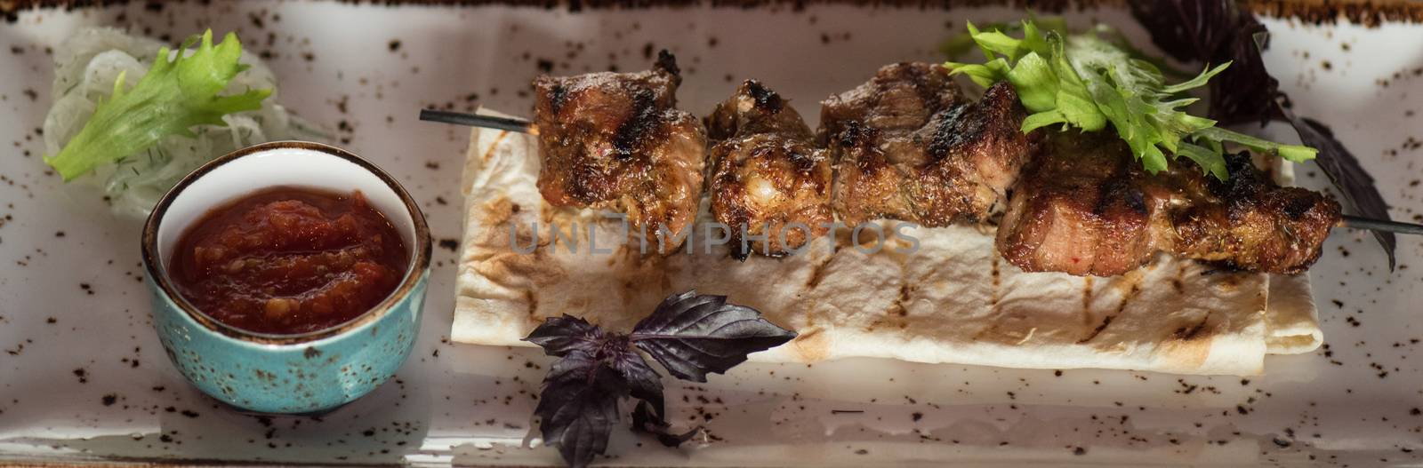 Grilled kebab pork meat by rusak