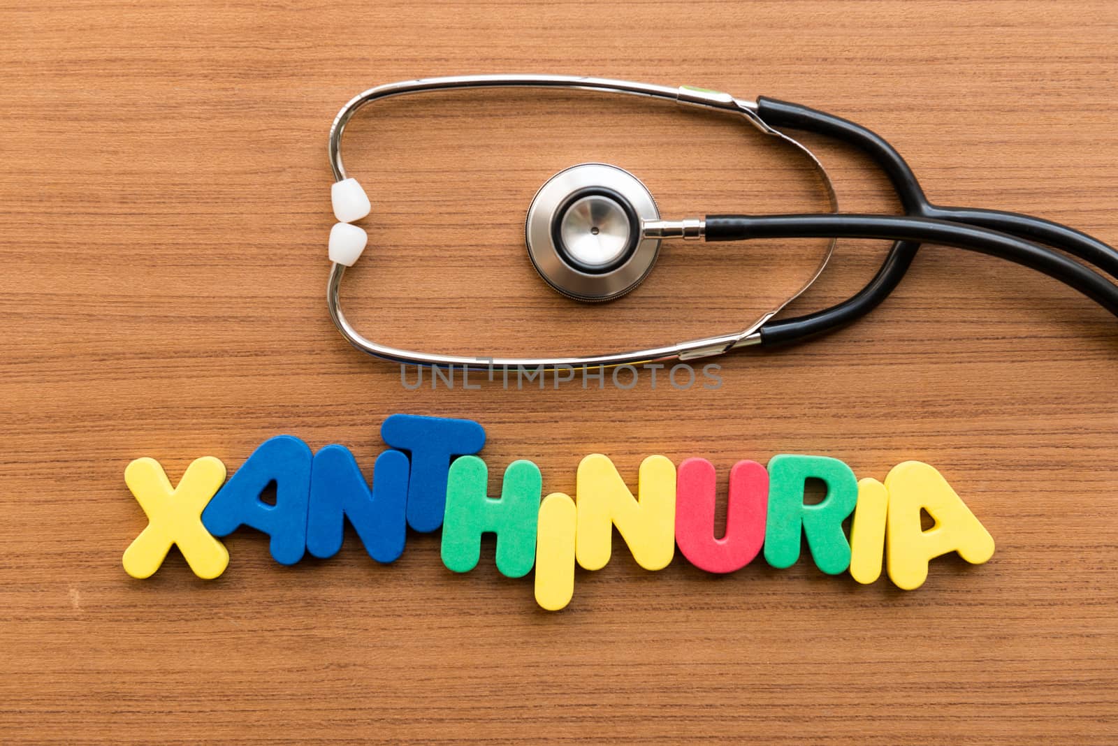 xanthinuria colorful word with stethoscope on wooden background