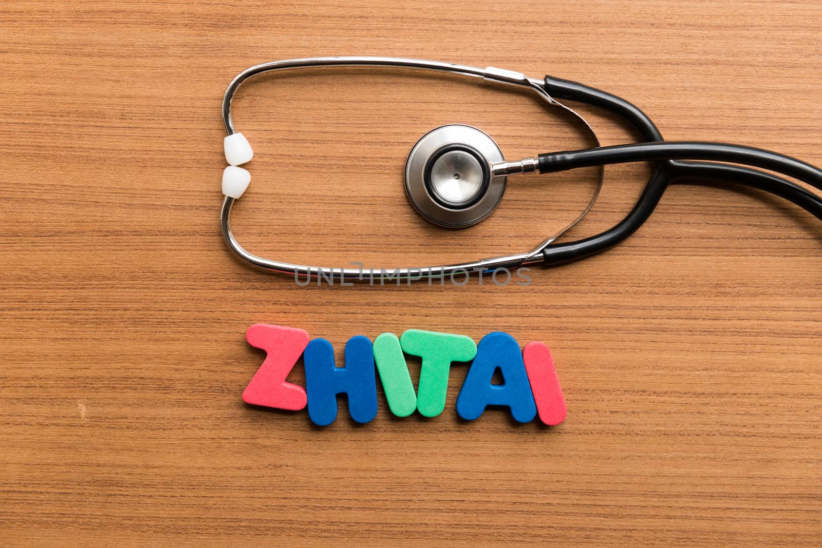 zhitai colorful word with stethoscope on wooden background