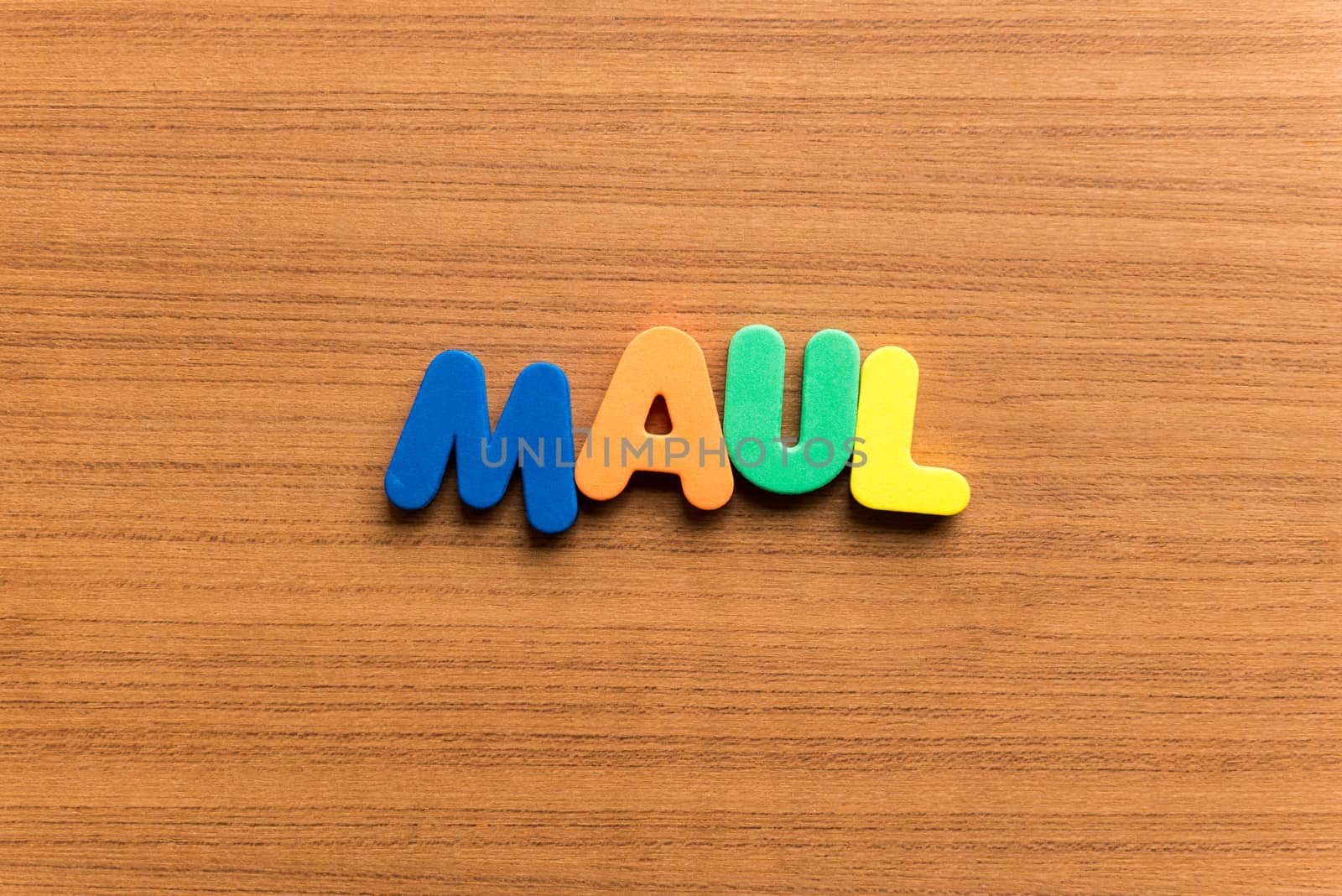 maul colorful word on the wooden background