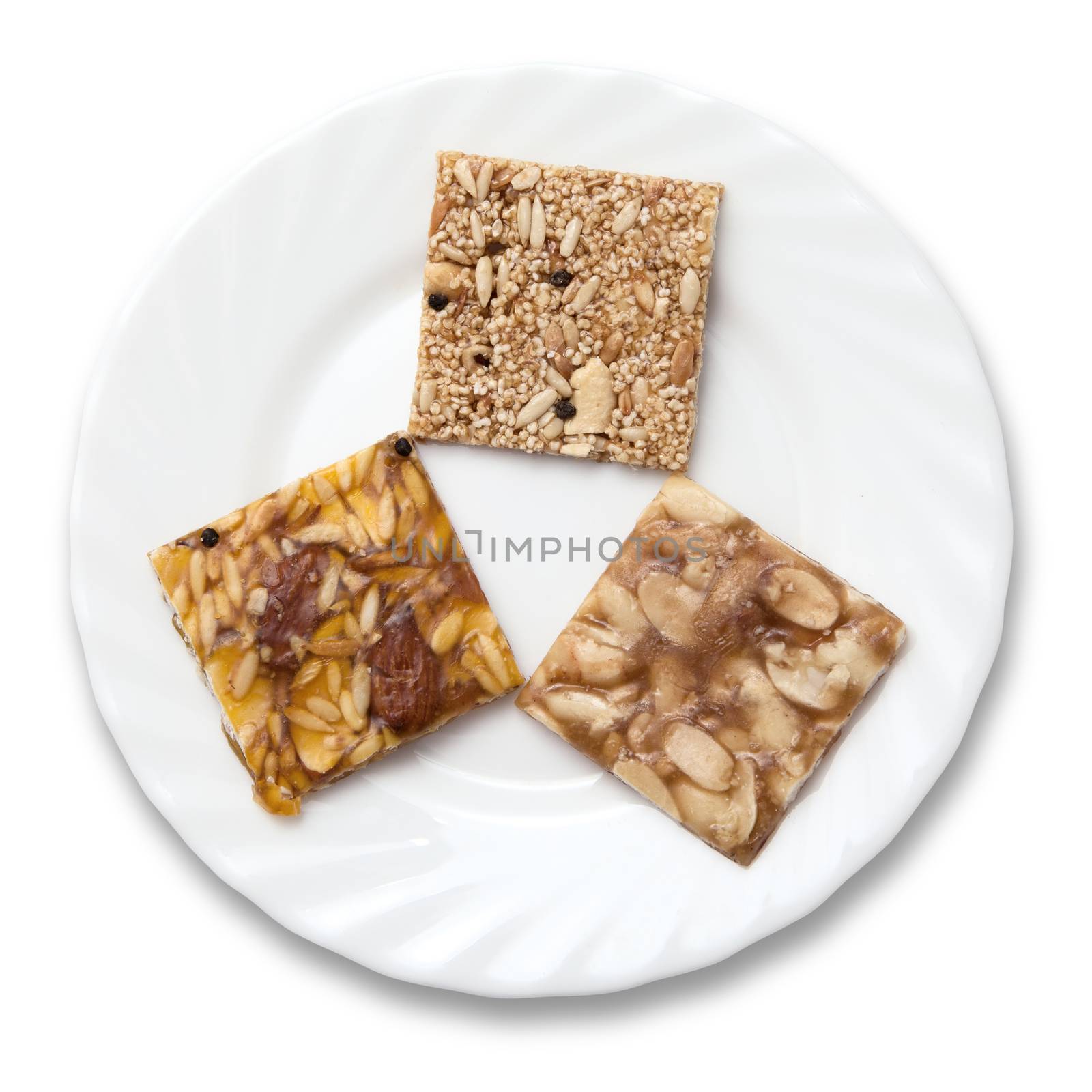 Various kinds of Indian sweet brittle on a plate