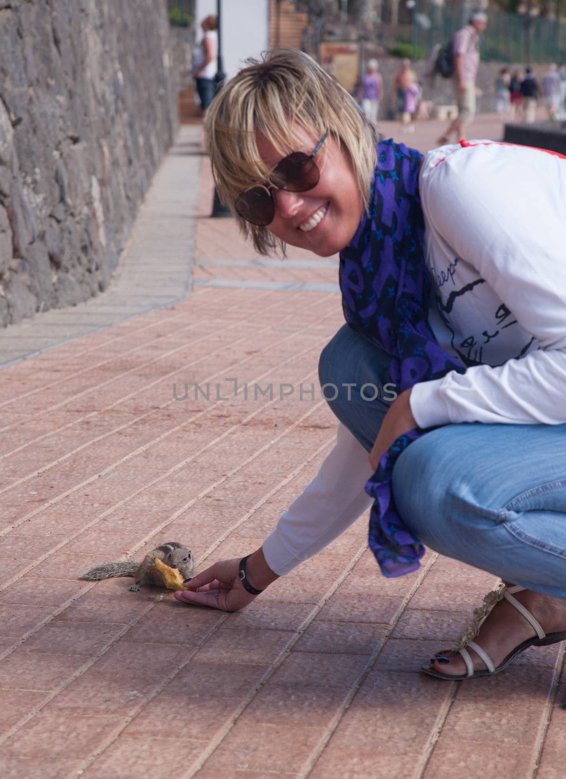 chipmunk funny animal with Woman Fuerteventura island Canarian Islands by desant7474
