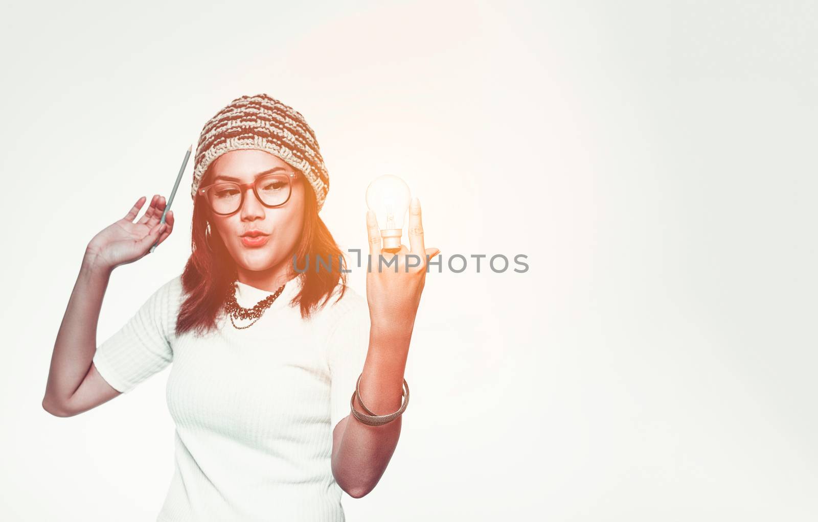 Asian woman with a light bulb idea emotionally by PhairinThee