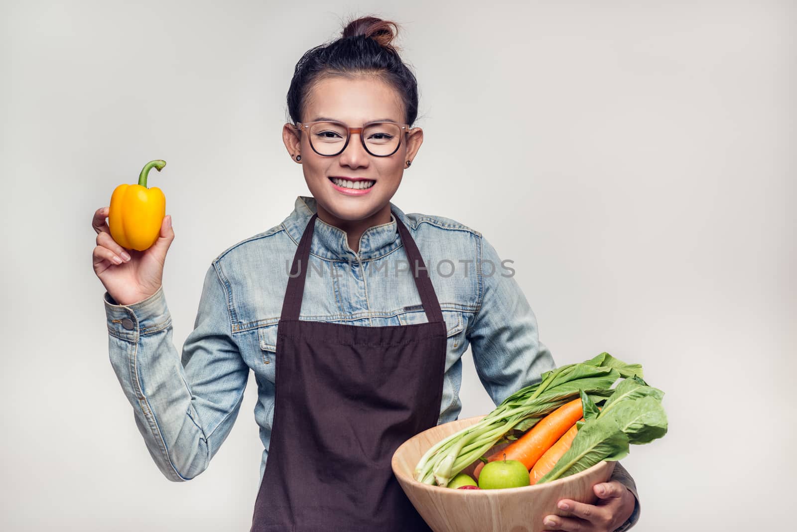 Asian women are admired vegetables
