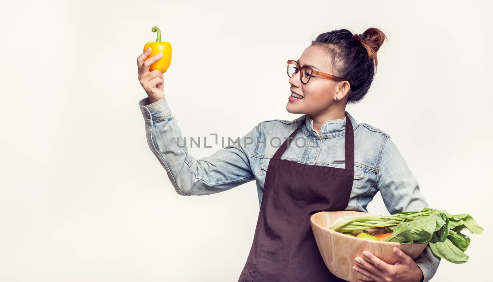 Asian women are admired vegetables