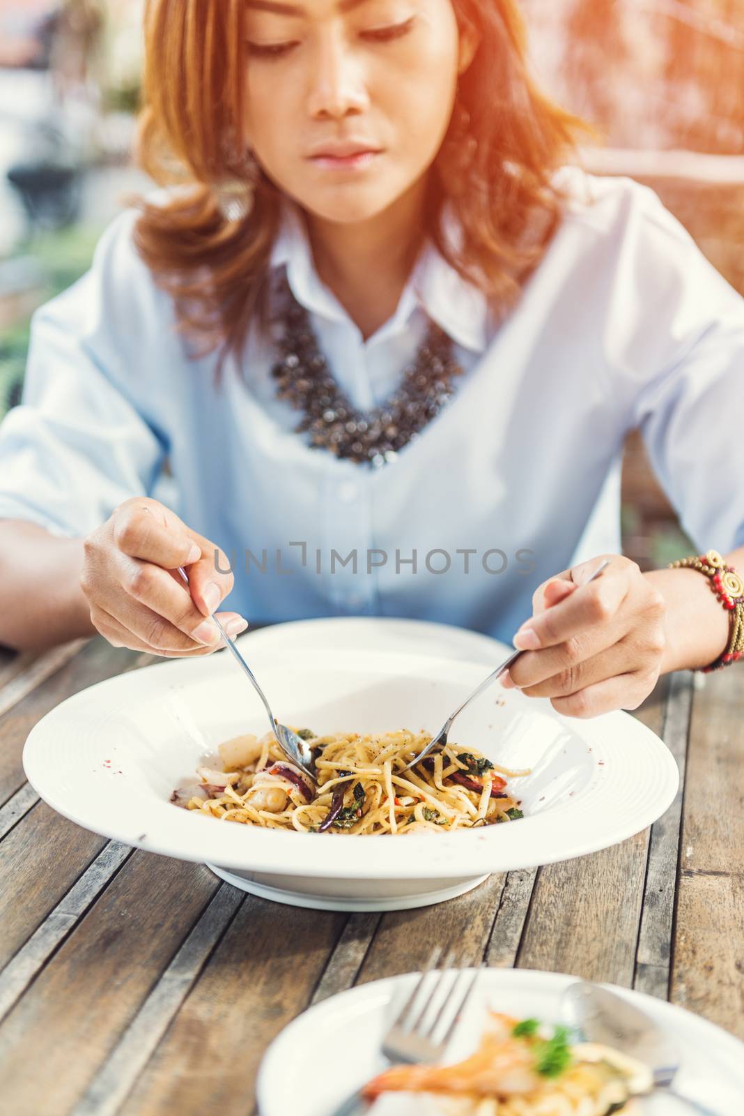 Asian women eating  by PhairinThee