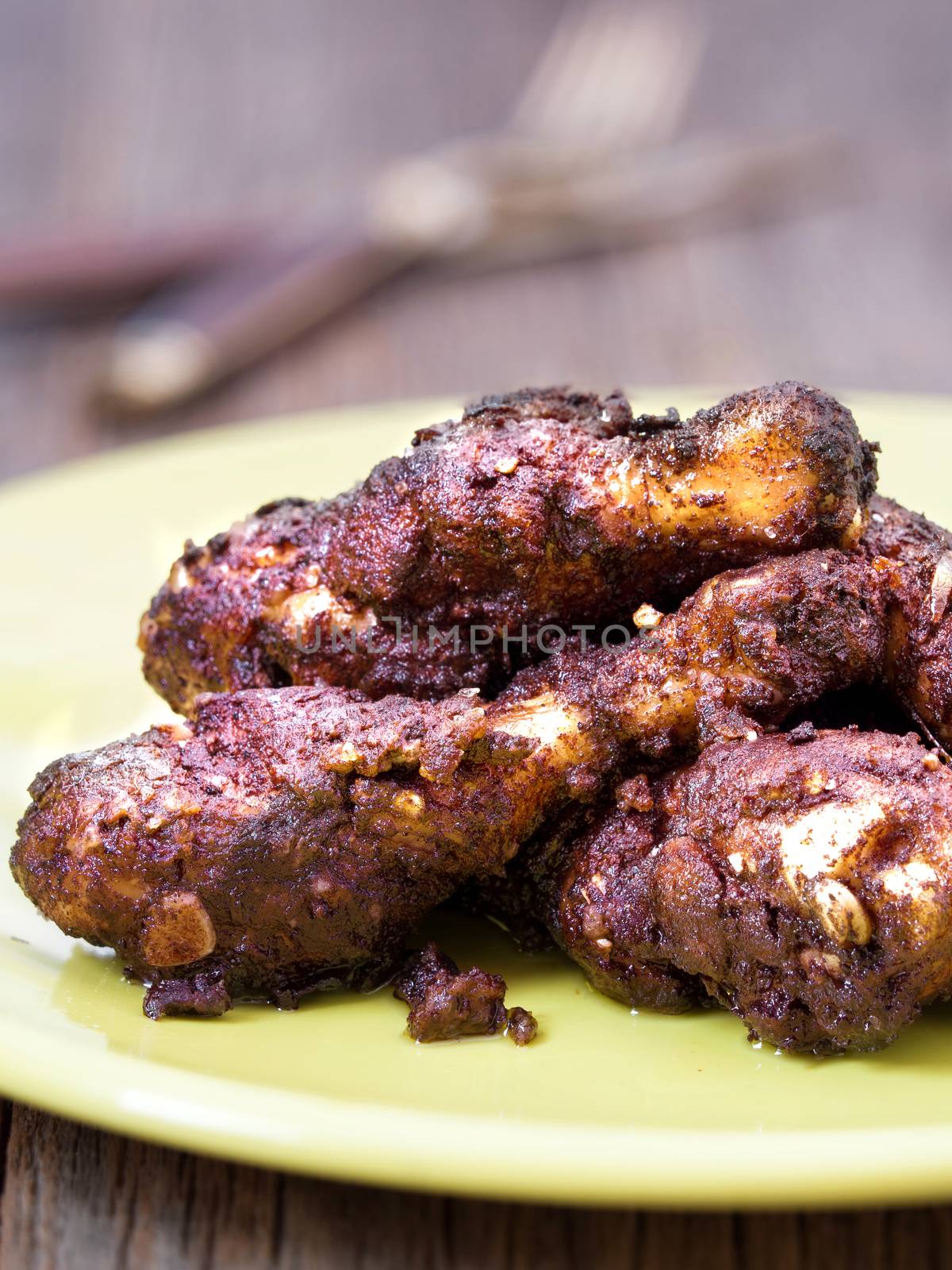 close up of spicy jamaican jerk chicken