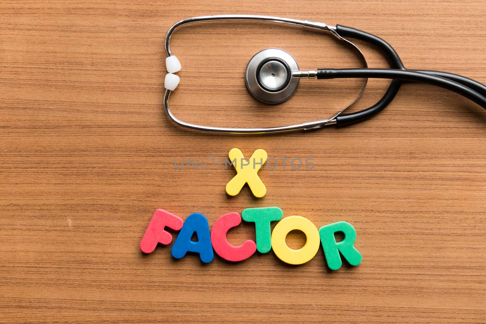 x factor colorful word with stethoscope by sohel.parvez@hotmail.com